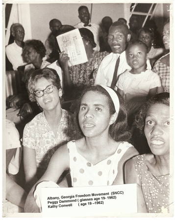 Peggy Trotter Dammond Preacely (in glasses) and Kathleen Conwell, just out of jail at a church in Albany, Ga., for a 1962 rally. (Courtesy of Peggy Trotter Dammond Preacely)