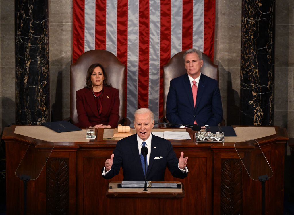 U.S. Vice President Kamala Harris and Speaker of the House Kevin McCarthy (R-CA) listen as President Joe Biden delivers the State of the Union address in the House Chamber of the US Capitol in Washington, DC, on Feb. 7, 2023. (NDREW CABALLERO-REYNOLDS/AFP—Getty Images)