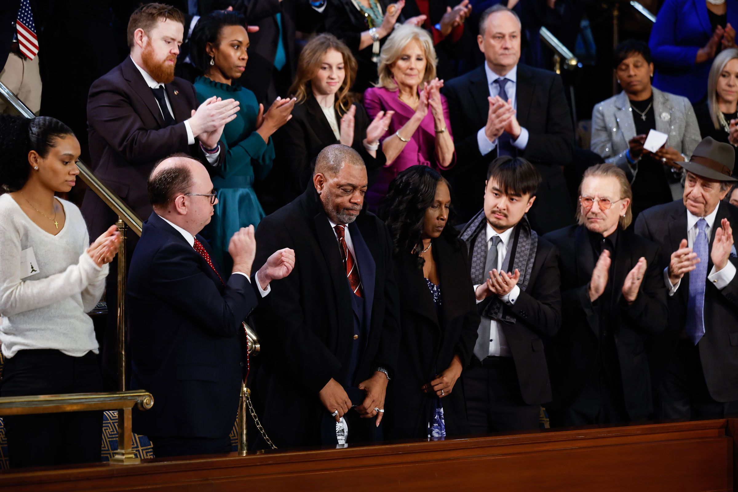 Rodney Wells and RowVaughn Wells, parents of Tyre Nichols, are applauded by Brandon Tsay, hero of the Monterey, Calif., shooting, Irish singer-songwriter Bono, and Paul Pelosi during President Joe Biden’s State of the Union address. (Chip Somodevilla—Getty Images)