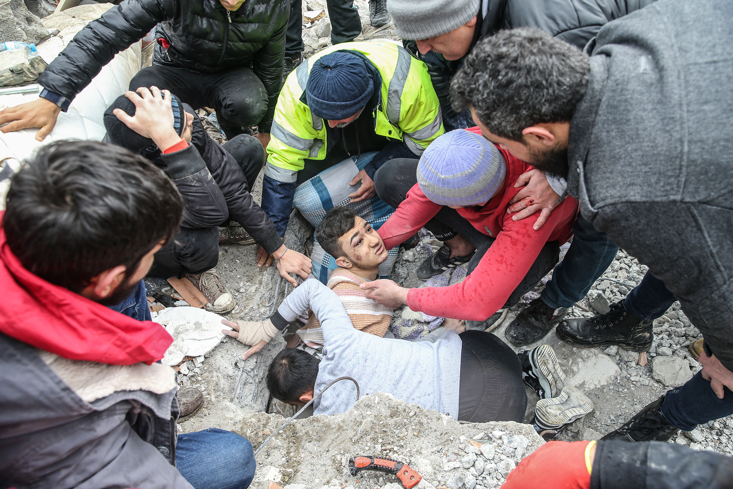 Mehmet Emin Ataoglu is rescued from the rubble of 6-story building in Hatay, Turkey. (2023 Anadolu Agency)
