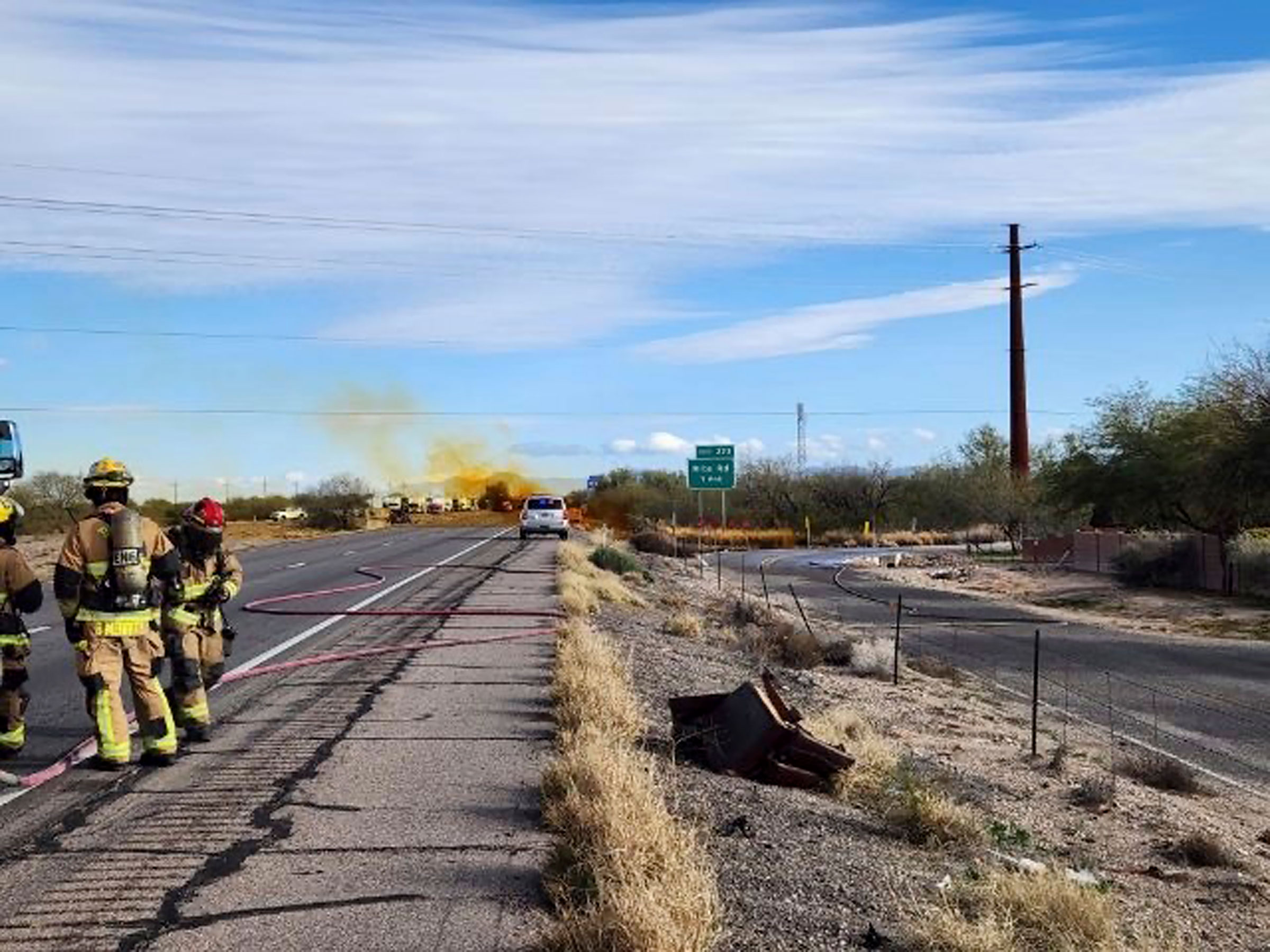 An accident involving a commercial tanker truck that caused a hazardous material to leak onto Interstate 10 outside Tucson, Ariz., on Feb. 14, 2023. (Arizona Department of Public Safety—AP)