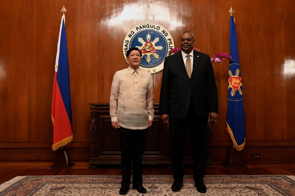 U.S. Secretary of Defense Lloyd Austin III poses for a photo with Philippine President Ferdinand Marcos Jr on Feb. 2, 2023 at the Malacanang Palace in Manila, Philippines. (Jamilah Sta Rosa—Pool/Getty Images)