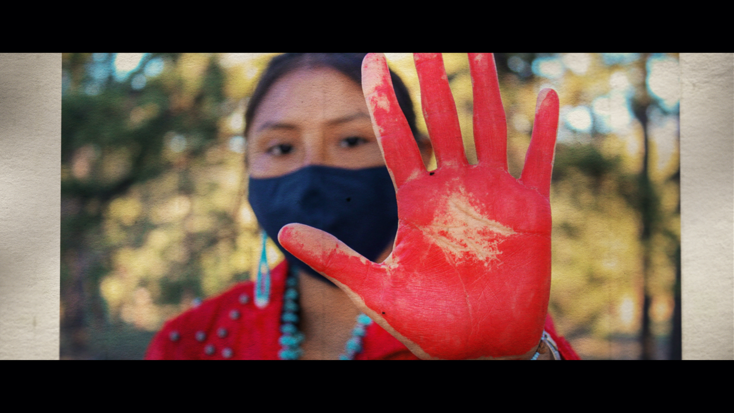 A young Native American woman wears red to support the Missing and Murdered Indigenous Women movement. (Courtesy of Showtime)