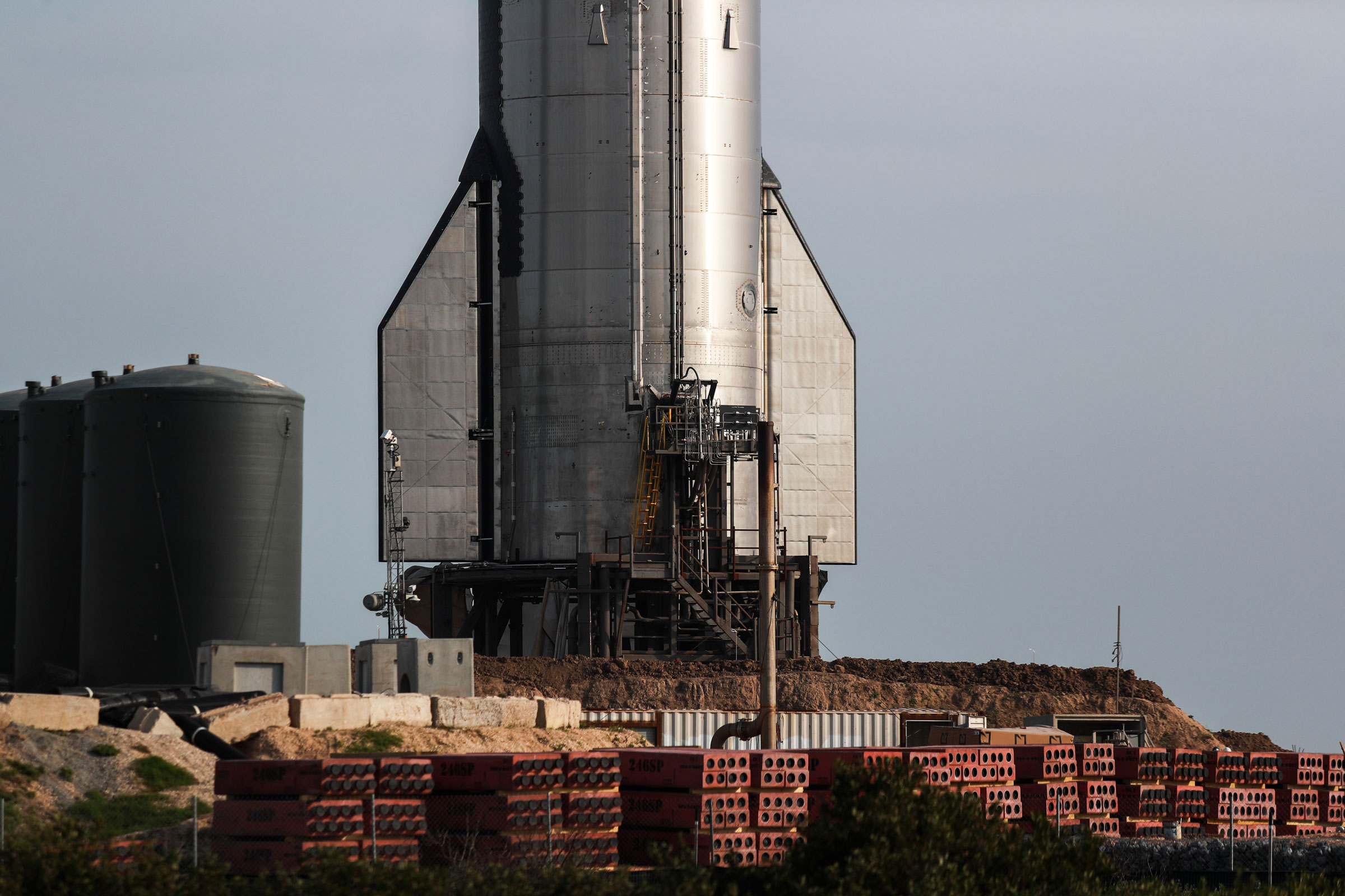 Starship 25 stands on a suborbital pad at SpaceX's south Texas facility near Brownsville, Texas