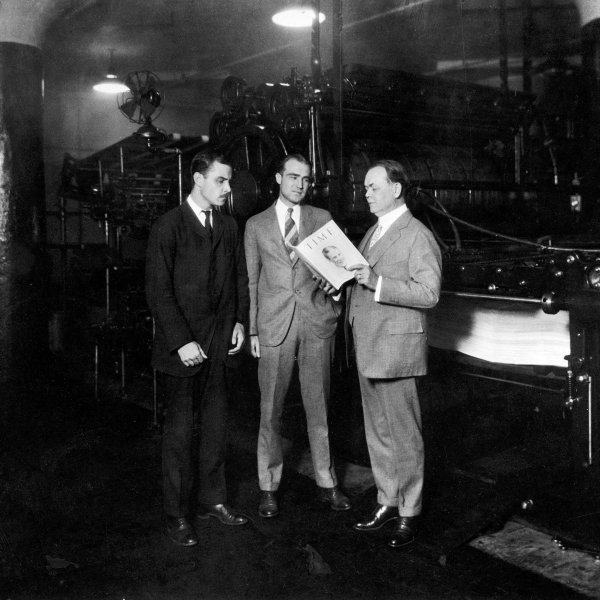 TIME co-founders Briton Hadden (left) and Henry Luce (center) with politician and Cleveland city manager William R. Hopkins, in Cleveland on Aug. 31, 1925