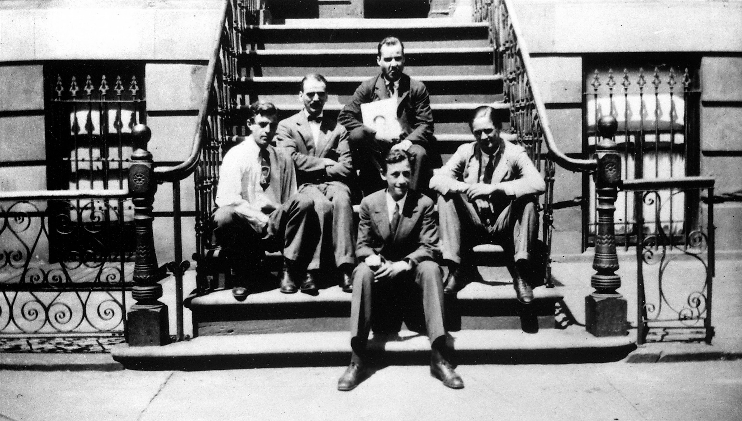 Early TIME magazine staffers outside the original building in New York City, circa 1924. Top-row: Briton Hadden; left-right: John S. Martin, T.J.C. Martyn and Niven Busch.