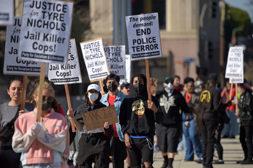 Protesters rally against the fatal police assault of Tyre Nichols, in front of the Los Angeles Police Department headquarters in Los Angeles, California, on January 28, 2023. (Agustin Paullier/AFP—Getty Images)
