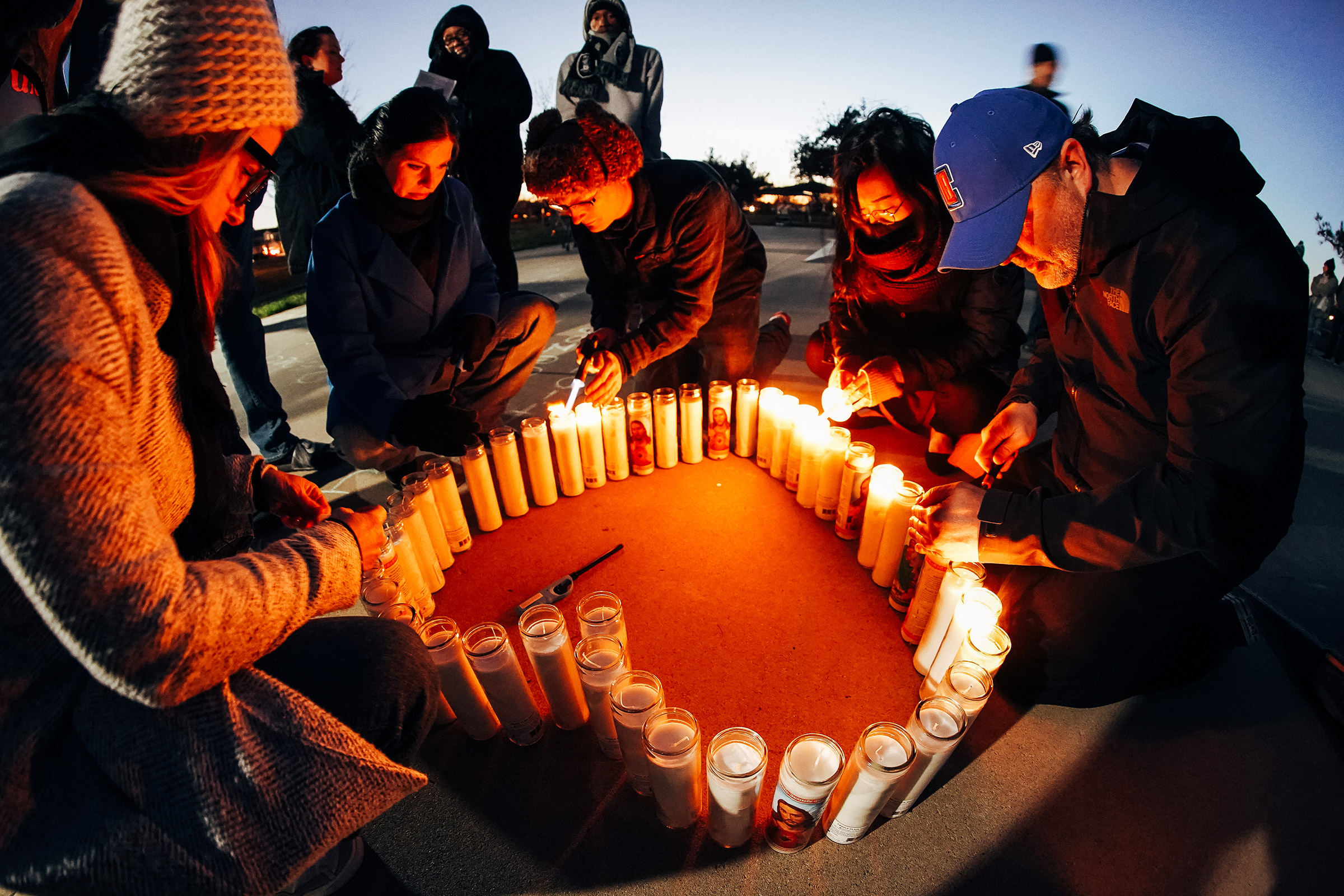 Community members light candles at a Jan. 30 vigil for Tyre Nichols at Regency Community Skatepark, one of the places he used to skate in Sacramento, Calif.