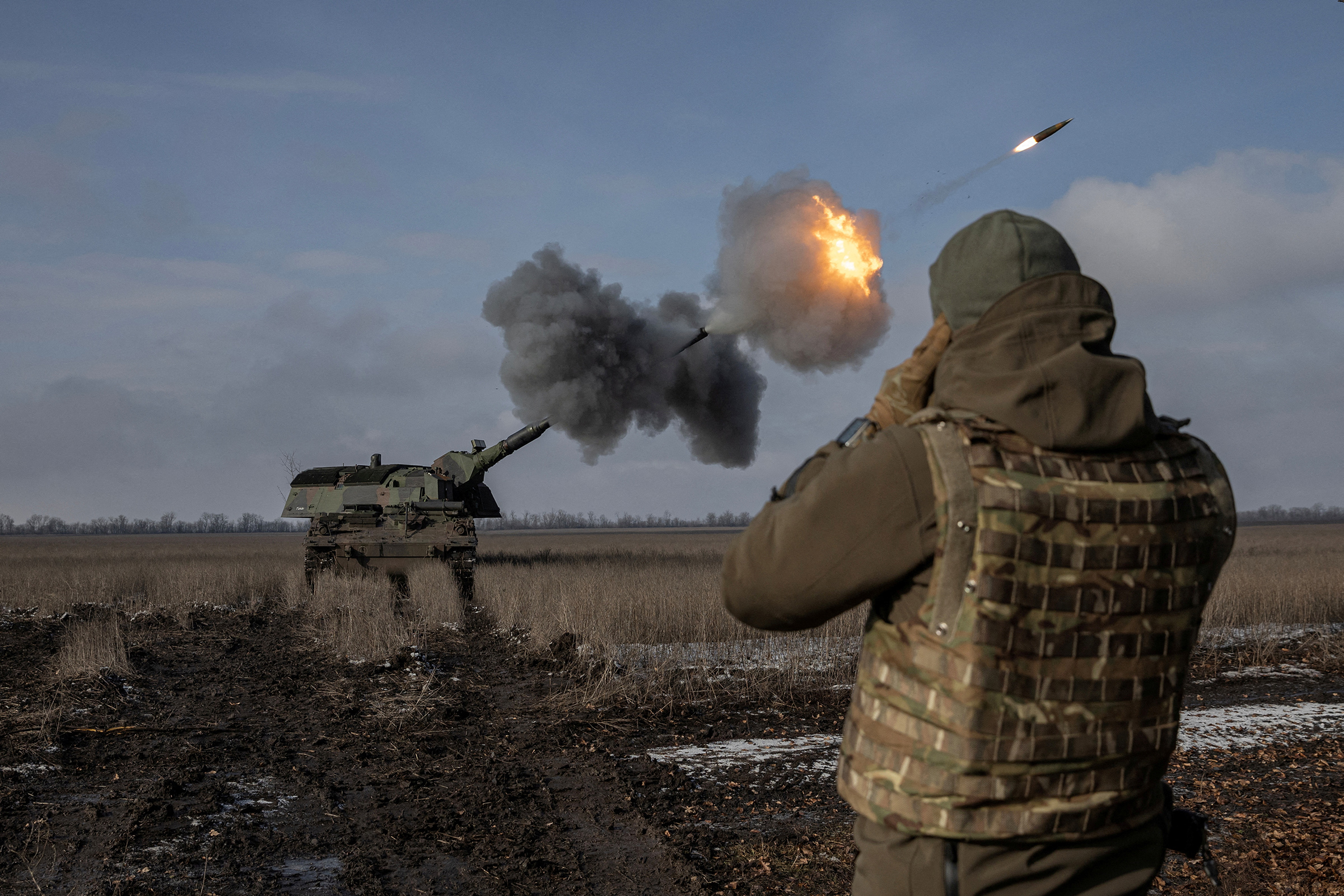 Ukrainian army from the 43rd Heavy Artillery Brigade fire the German howitzer Panzerhaubitze 2000, called Tina by the unit, amid Russia's attack on Ukraine, near Bakhmut,in Donetsk region, Ukraine, on Feb. 5. (Marko Djurica—Reuters)