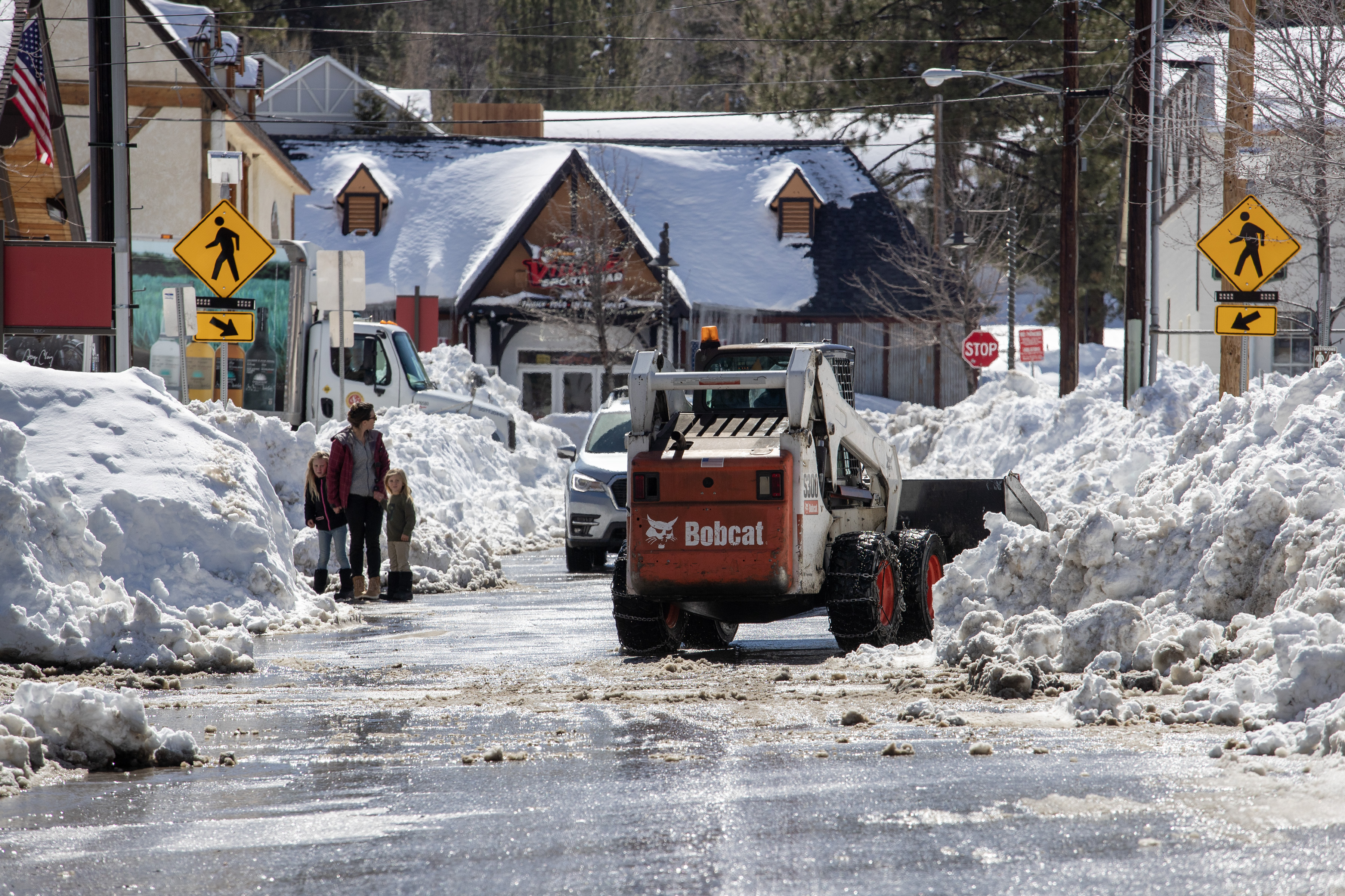 Big Bear Lake streets are still choked with snow following successive storms which blanketed San Bernardino Mountain communities on Friday, March 3, 2023 in Big Bear Lake, Calif. (Brian van der Brug–Los Angeles Times via Getty Images)