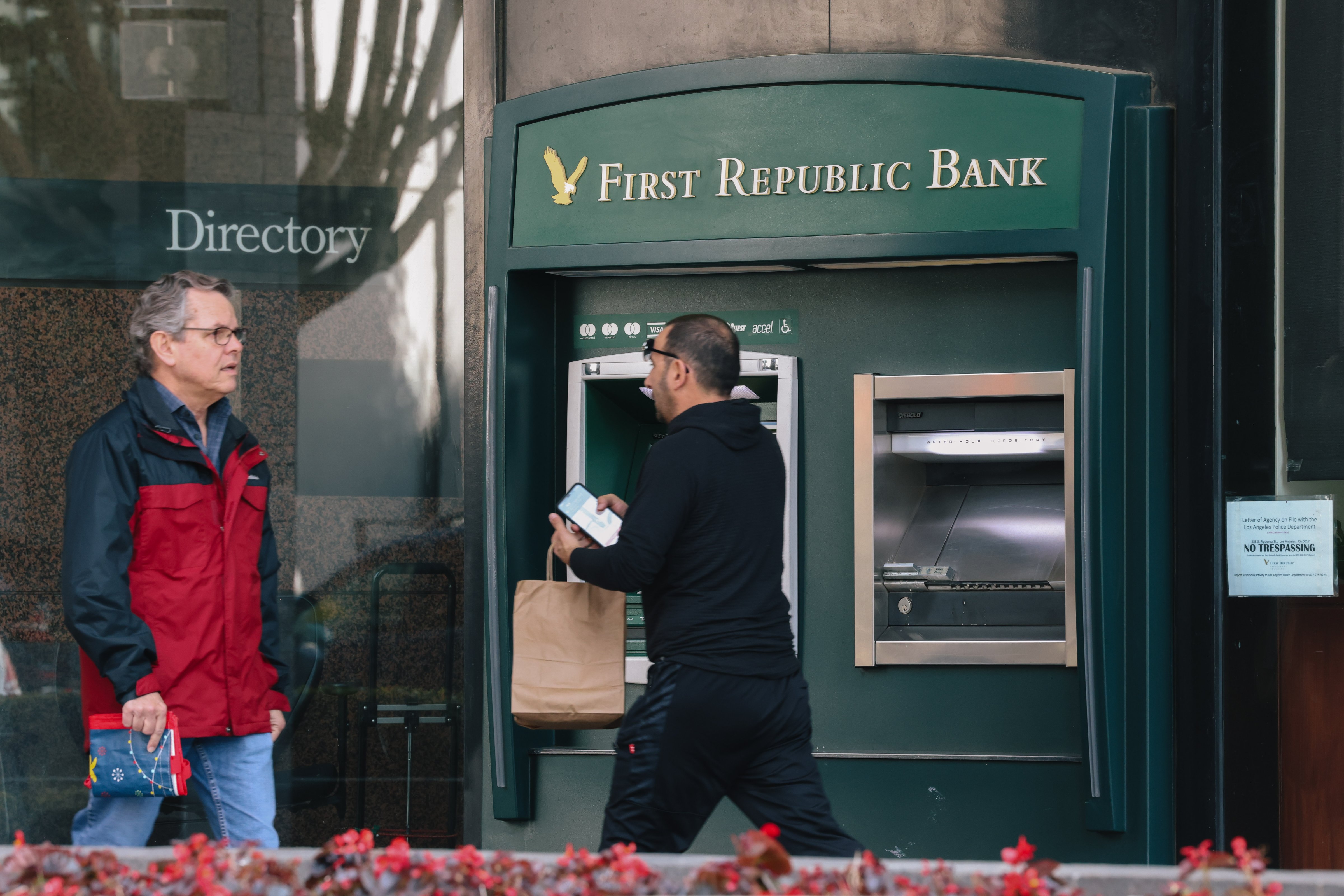 Dozens of customers lined up outside of a First Republic Bank in southern California on March 11 eager to withdraw their funds in the wake of the collapse of Silicon Valley Bank. (Dania Maxwell–Los Angeles Times via Getty Images)