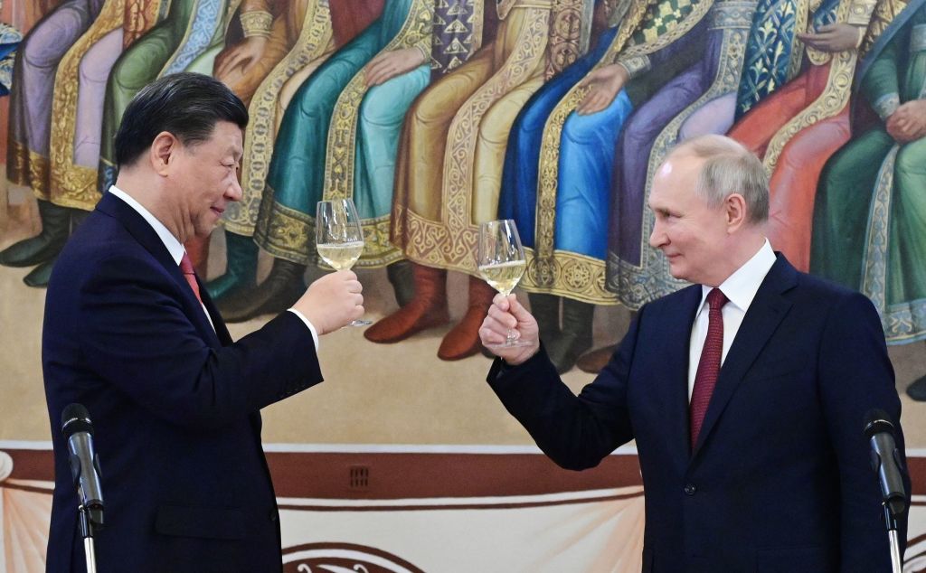 Russian President Vladimir Putin and China's President Xi Jinping make a toast during a reception following their talks at the Kremlin in Moscow on March 21, 2023. (Pavel Byrkin-SPUTNIK /AFP)