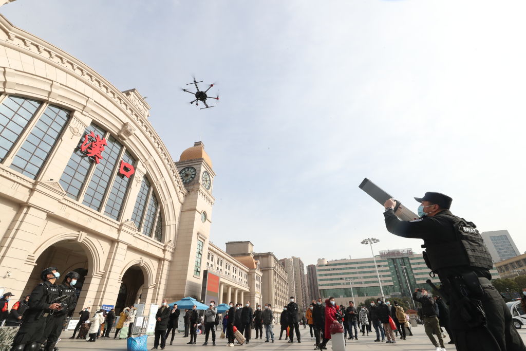 A police officer presents an anti-drone gun during Railway Police Open Day at Hankou Railway Station on January 7, 2021 in Wuhan, Hubei. (Hu Jinli—VCG/Getty Images)