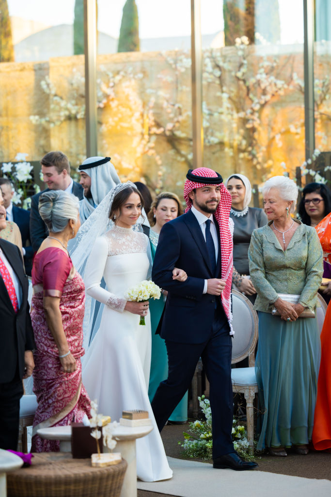 In this handout from the Jordanian Royal Court, Princess Iman and her brother Crown Prince Hussein at the Royal wedding of Princess Iman Bint Abdullah II and Jameel Alexander Thermiotis on March 12, 2023 in Amman, Jordan. (Jordanian Royal Court—Getty Images)