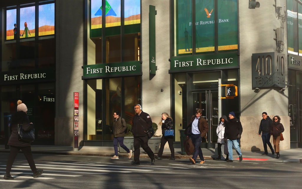 People walk across 10th Avenue in front of a First Republic Bank branch on March 20, 2023, in New York City. (Gary Hershorn/Getty Images)