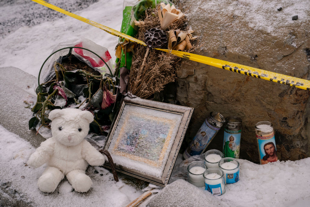 Objects left for a makeshift memorial sit at the site of a quadruple murder on in Moscow, Idaho, on January 3, 2023. (David Ryder—Getty Images)