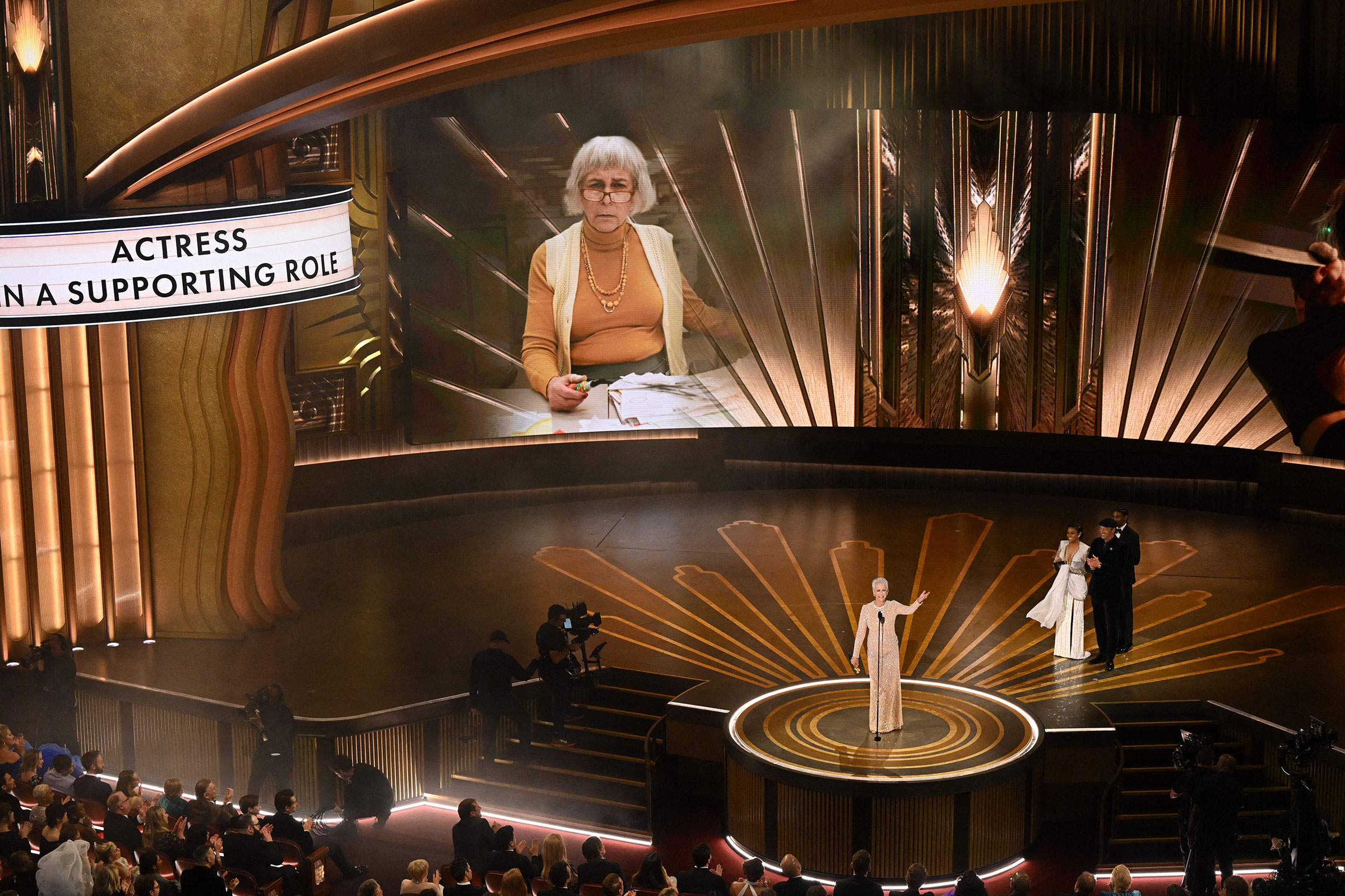 Jamie Lee Curtis accepts the Oscar for Best Actress in a Supporting Role for "Everything Everywhere All at Once" onstage during the 95th Annual Academy Awards.