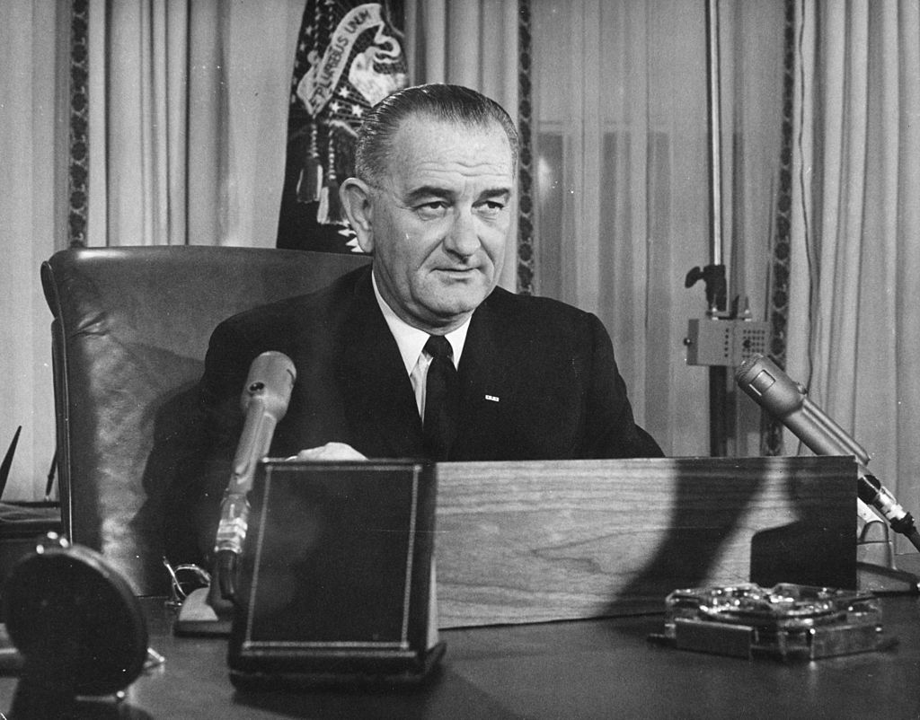 American President Lyndon B. Johnson addresses the American people on his first Thanksgiving Day television program, broadcast from the executive offices of the White House. (Keystone—Getty Images)
