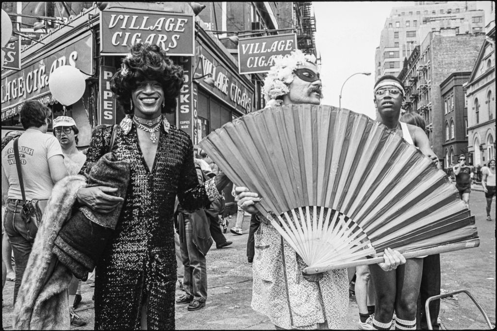 American gay liberation activist Marsha P Johnson (center left) in a crowd during the Pride March (later the LGBT Pride March) in New York on June 27, 1982. (Barbara Alper—Getty Images)
