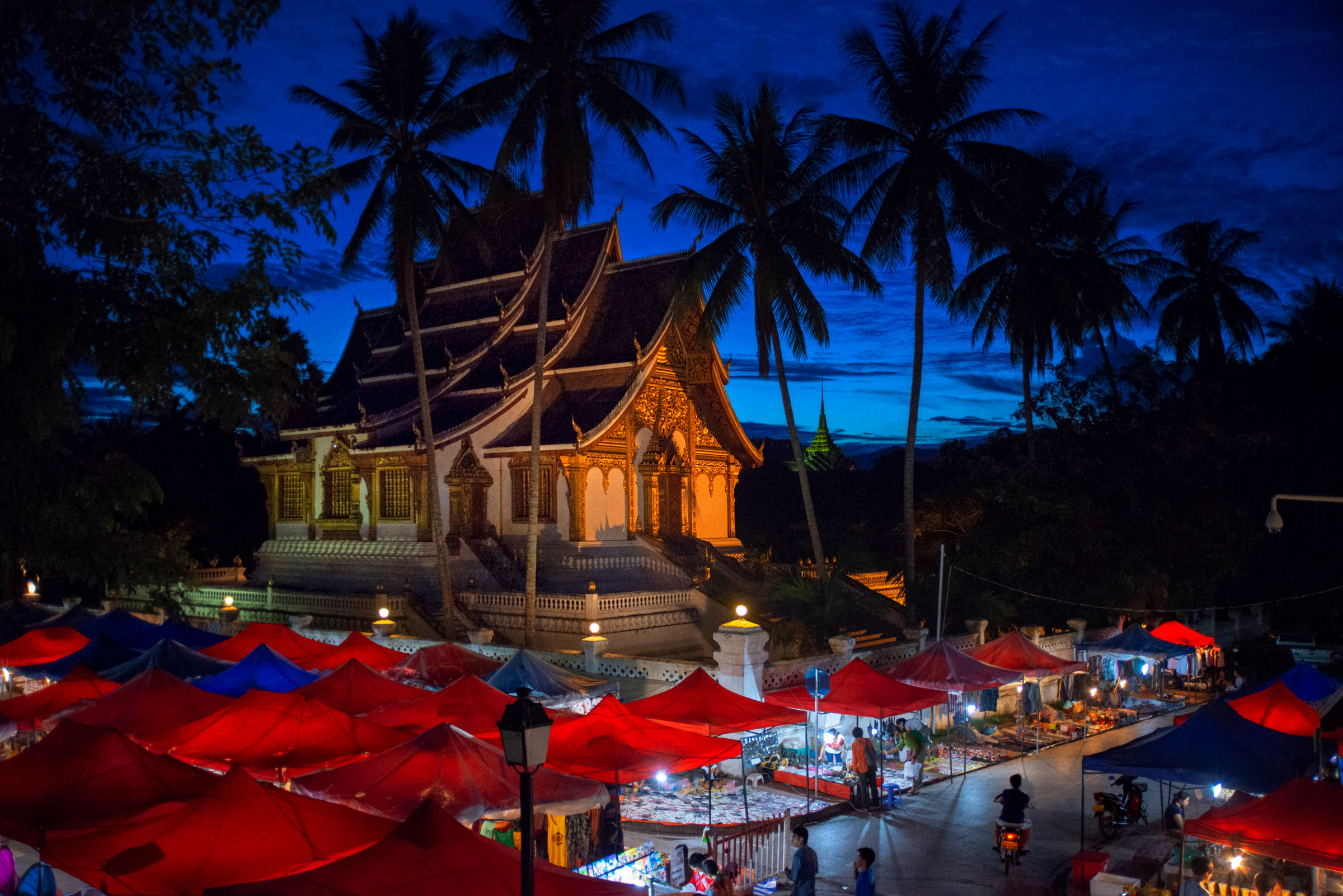 Royal Palace and Luang Prabang night market in Luang Prabang, Laos. (Sergi Reboredo—VWPics/Redux)