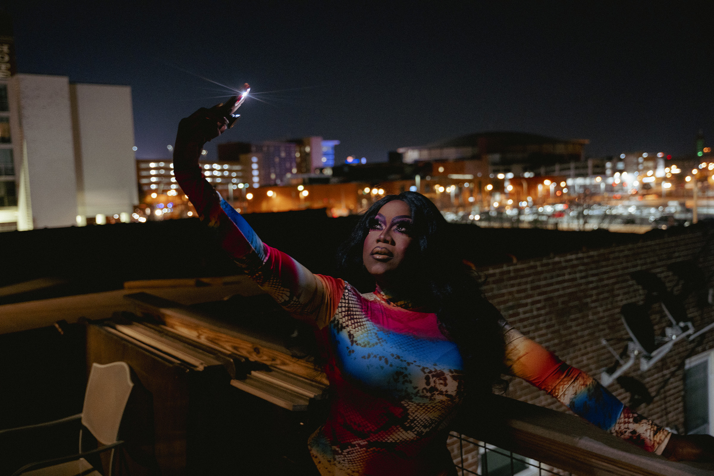 Infiniti Bonet takes a selfie of her first performance look for the drag show at IBIS. (Andrea Morales for TIME)