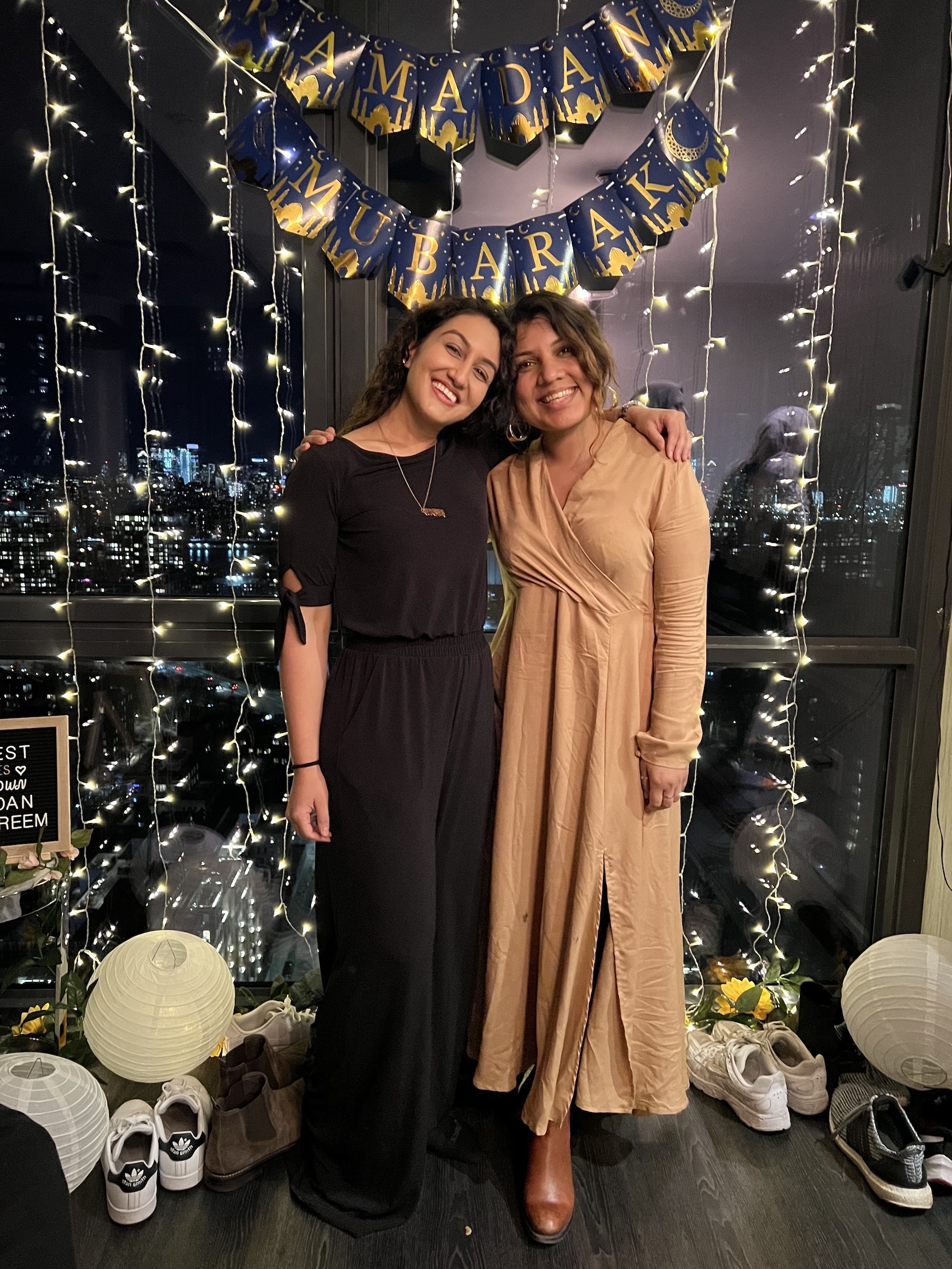 Aniqa Mian (right) with her friend at a 2022 iftar gathering, in which Muslims open their fast, in New York (Aniqa Mian)
