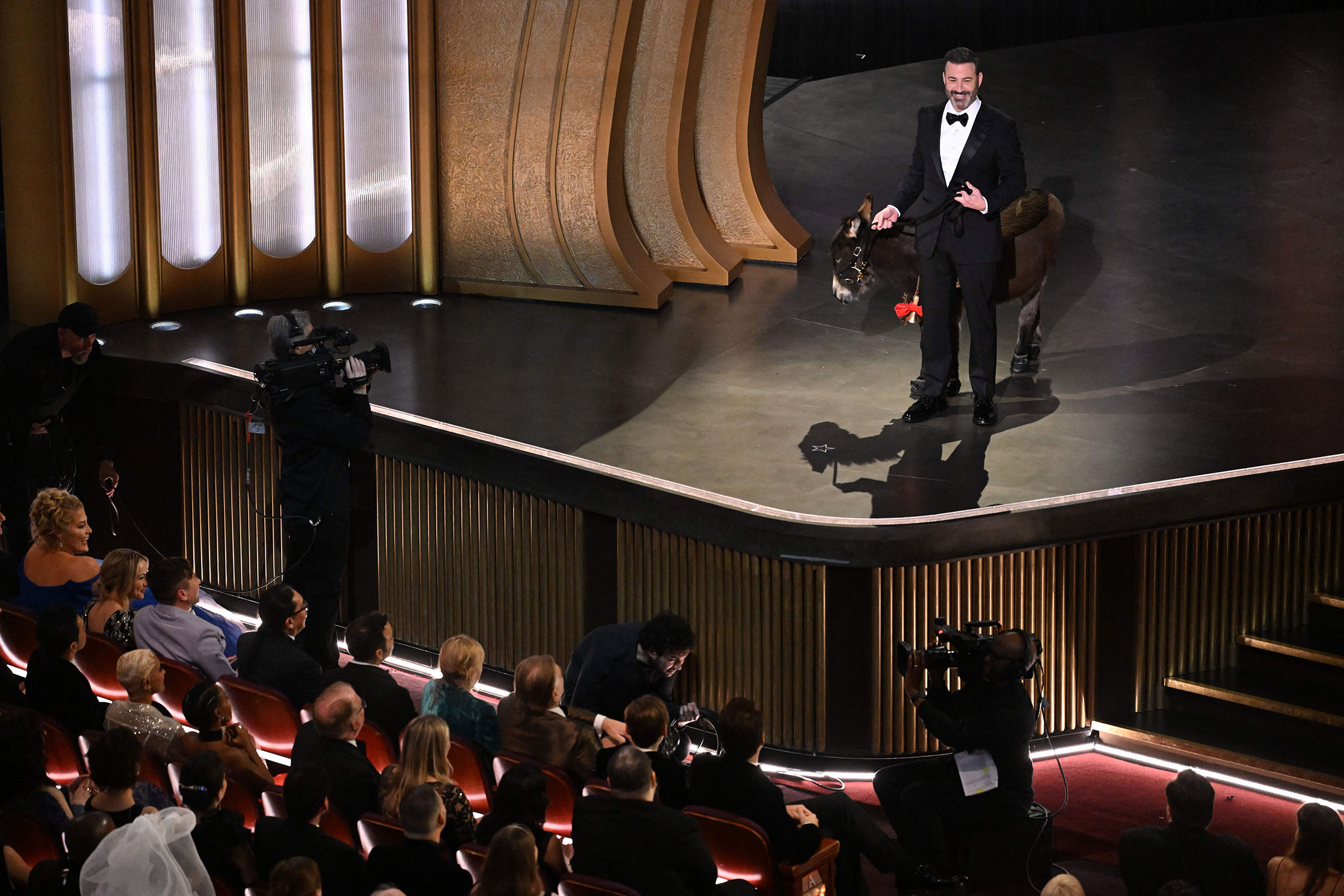 Host Jimmy Kimmel walks onstage with a donkey during the 95th Annual Academy Awards at the Dolby Theatre in Hollywood. (Patrick T. Fallon—AFP/Getty Images)