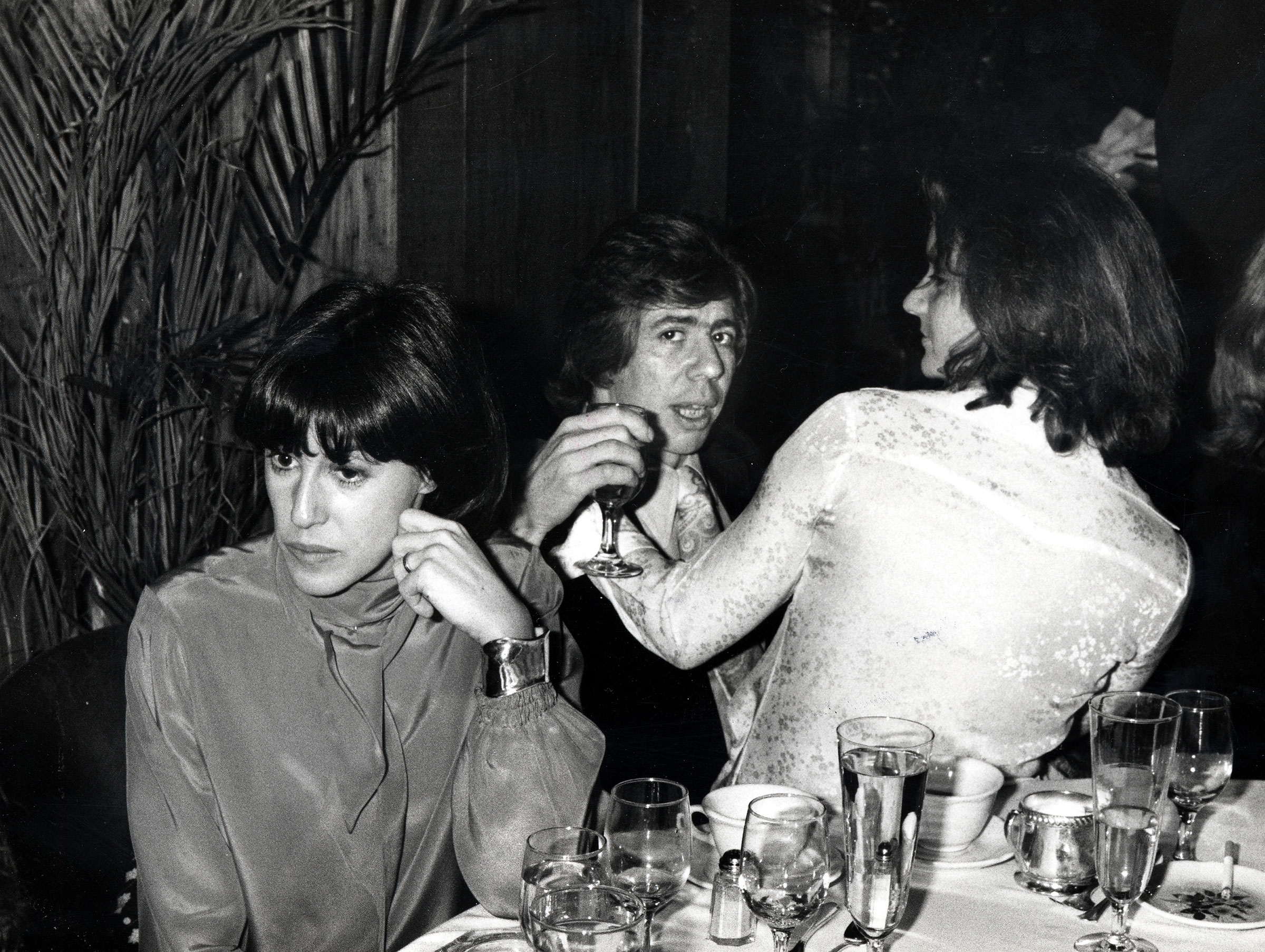 The marriage of Nora Ephron (left) and Carl Bernstein, pictured with another guest at a 1977 New York City event, was the subject of media gossip and scrutiny. (Ron Galella Collection/Getty Images)
