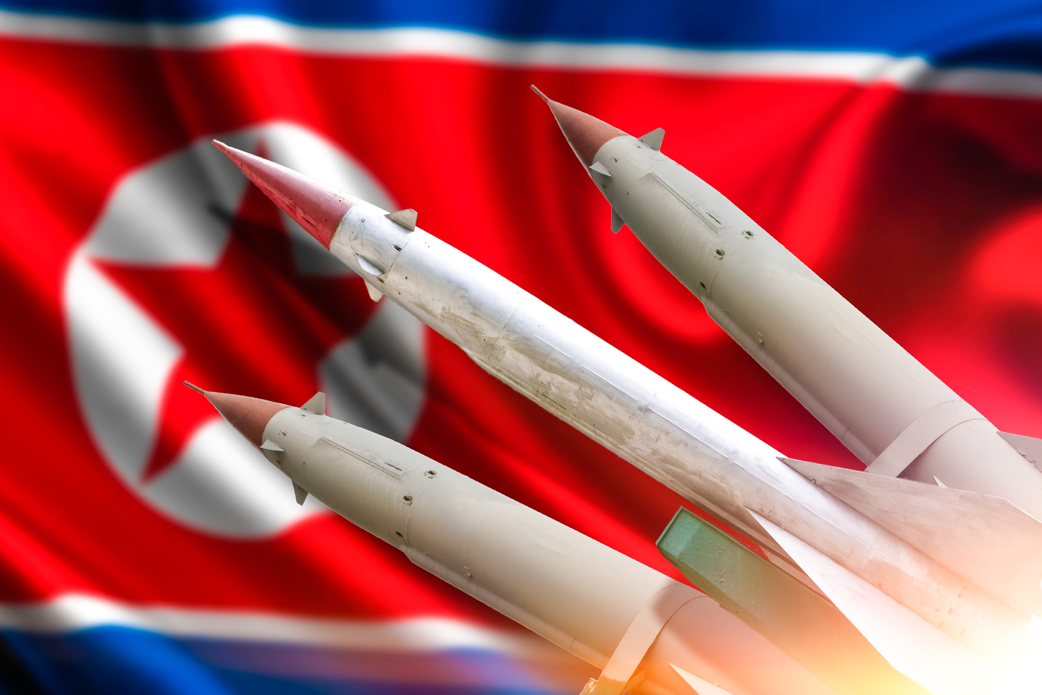 The rocket to launch. The flag of North Korea.