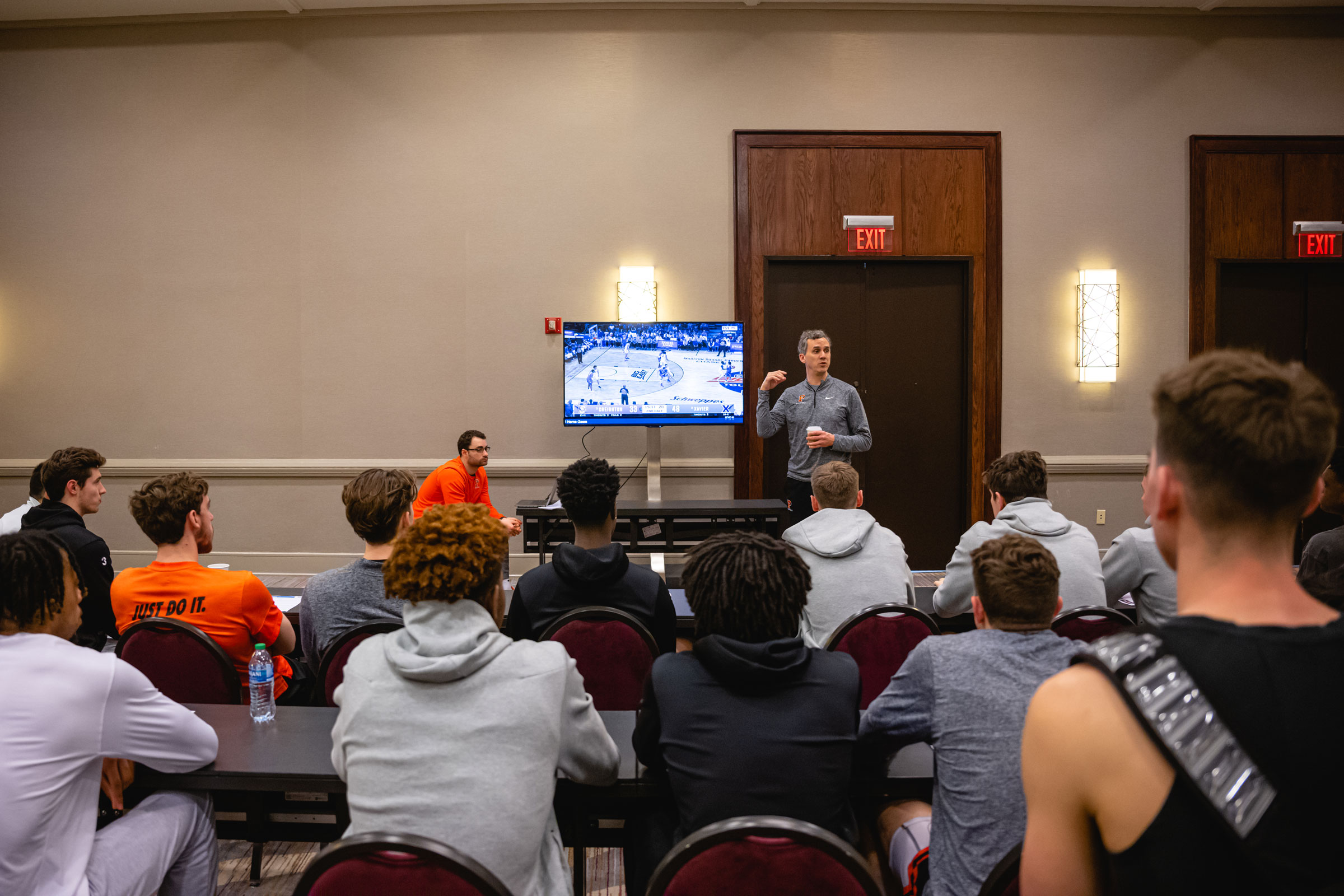 Coach Mitch Henderson reviews play footage during a team meeting at Hyatt Regency Hotel in Louisville, Kentucky on March 23, 2023.
