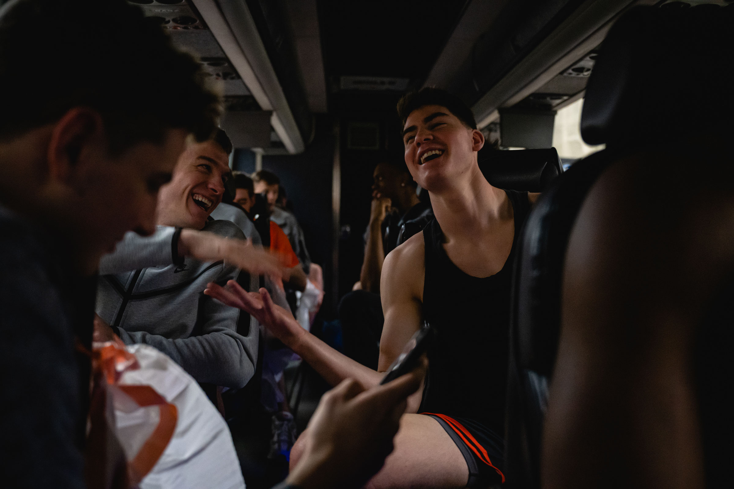 Blake Peters (L) and Jack Scott (R) laugh on the team bus on their way to the arena. (Jon Cherry for TIME)