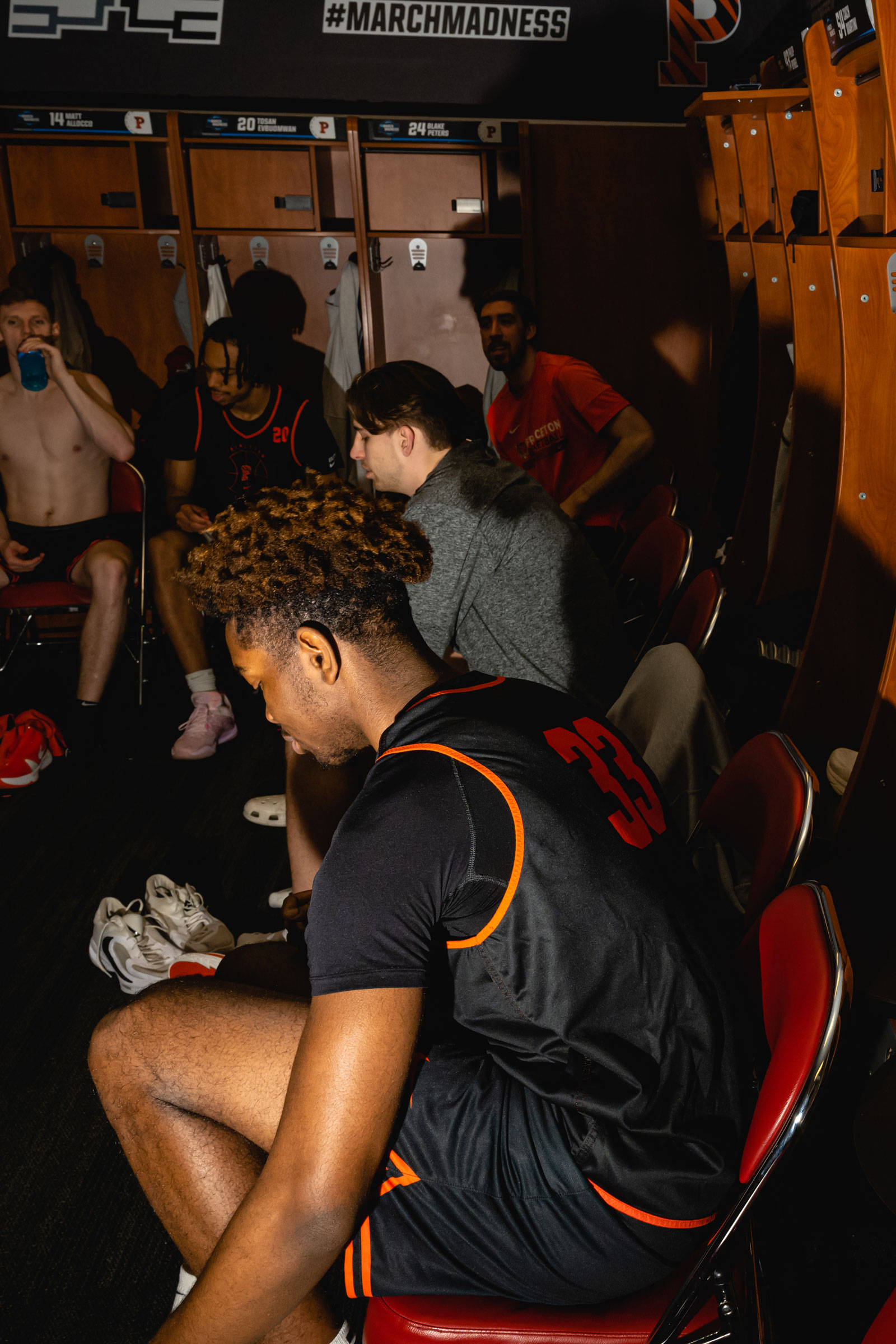 Vernon Collins and his teammates get ready for practice in their locker room at the KFC YUM! Center in Louisville, Kentucky on March 23, 2023.