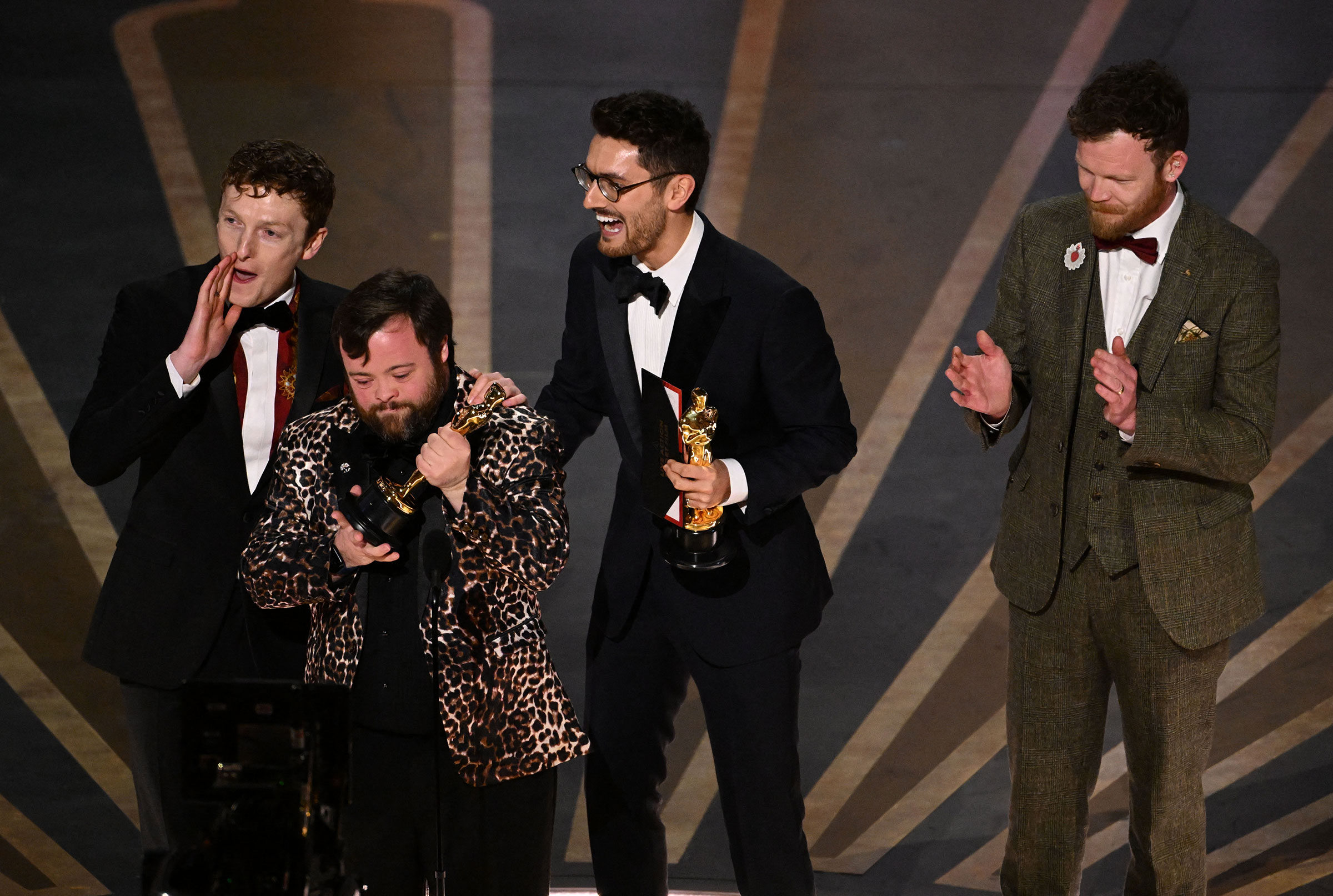 Ross White, James Martin , Tom Berkeley and Seamus O'Hara accept the Oscar for Best Live Action Short Film for "An Irish Goodbye". (Patrick T. Fallon—AFP/Getty Images)
