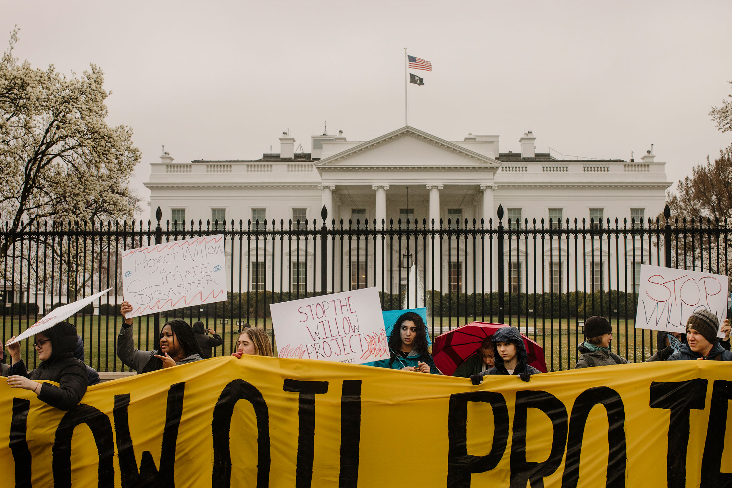 Activists gather outside the White House to call on President Joe Biden to halt the Willow Project in Alaska, in Washington on March 3, 2023. (Jason Andrew—The New York Times/Redux)