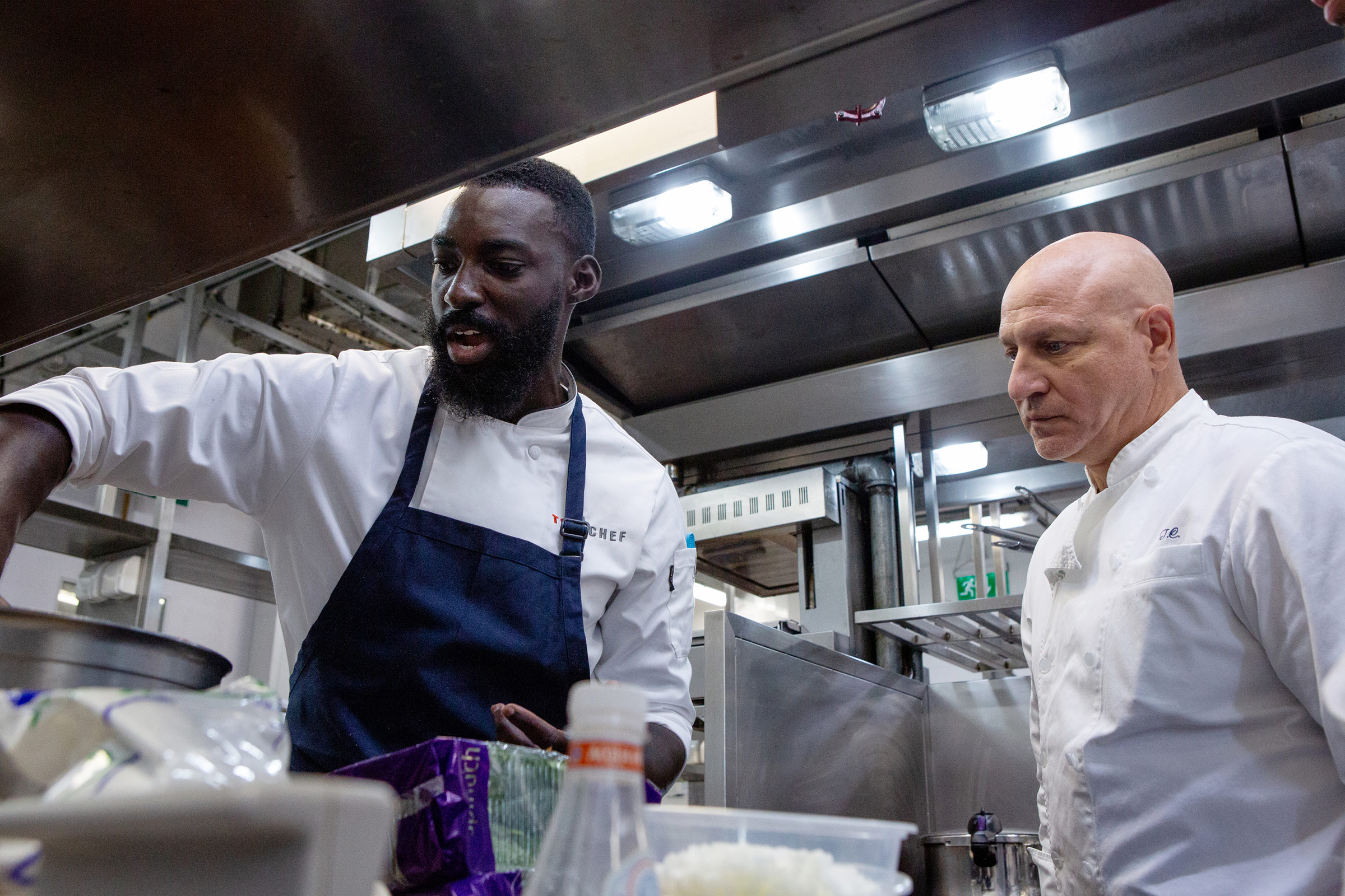 Eric Adjepong, left, and Tom Colicchio in season 16 of Top Chef.