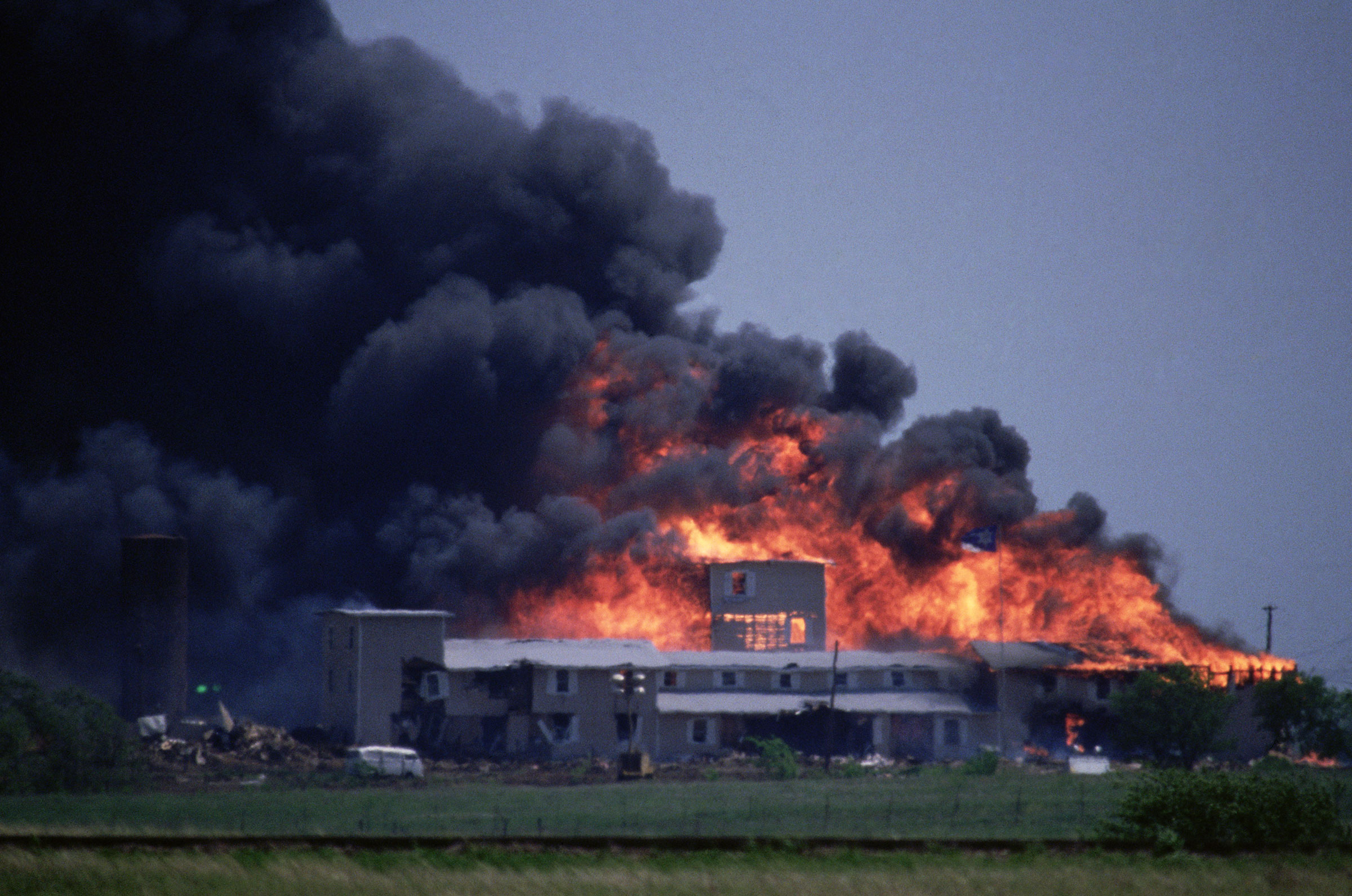 The Branch Davidians' Mount Carmel compound outside of Waco, Texas, burns to the ground during the 1993 raid by the ATF. (Greg Smith—CORBIS/Corbis/Getty Images)