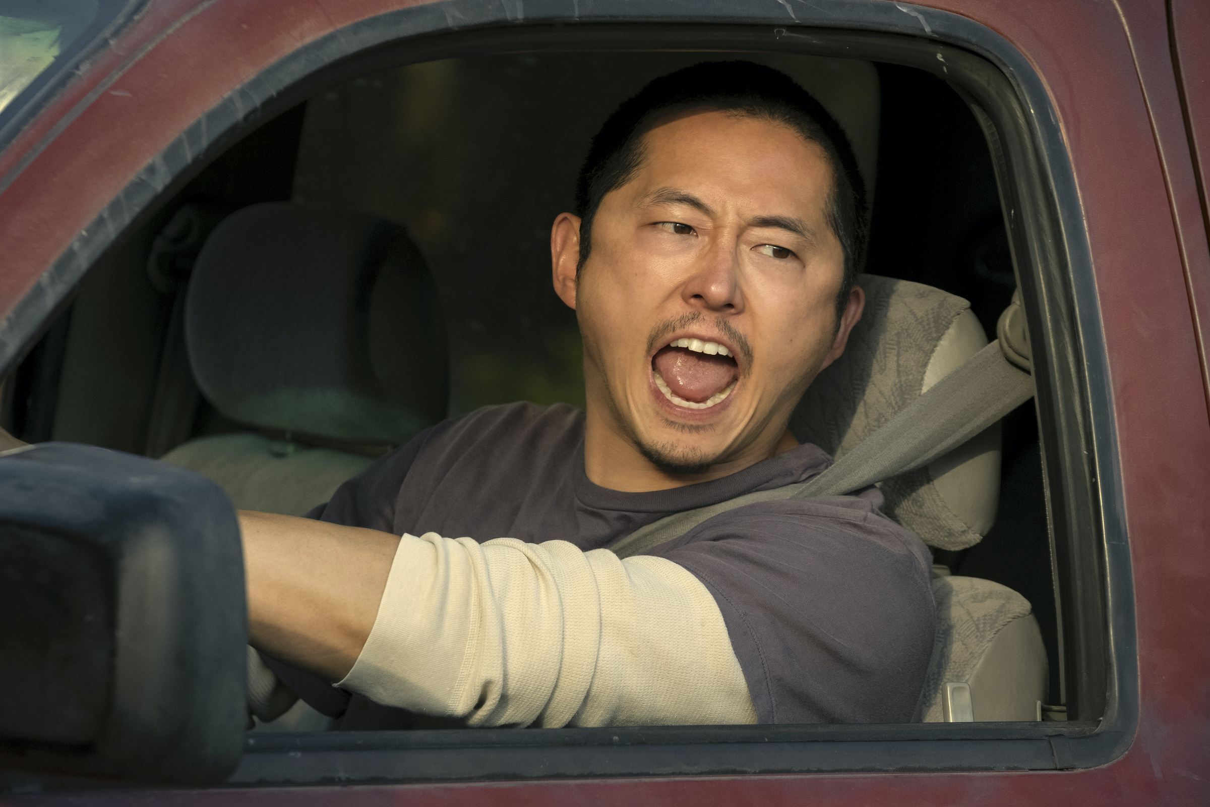 Danny (Steven Yeun) screams at his opponent in the titular road rage "beef." (Andrew Cooper—Netflix)
