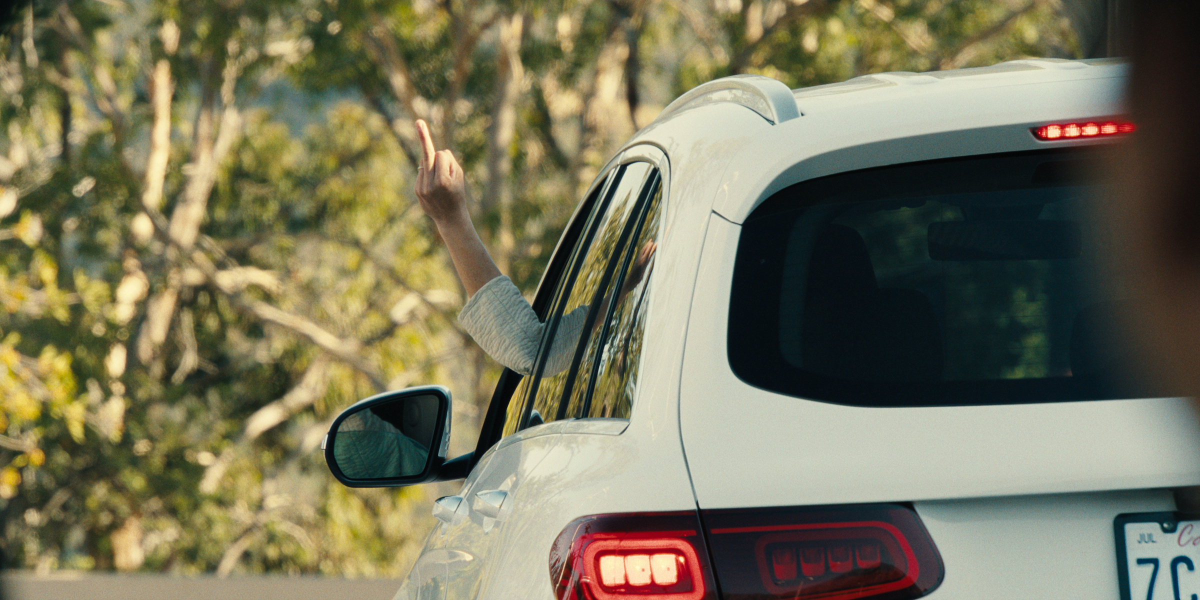 Amy (Ali Wong) flips off her opponent in the titular road rage "beef." (Courtesy of Netflix)