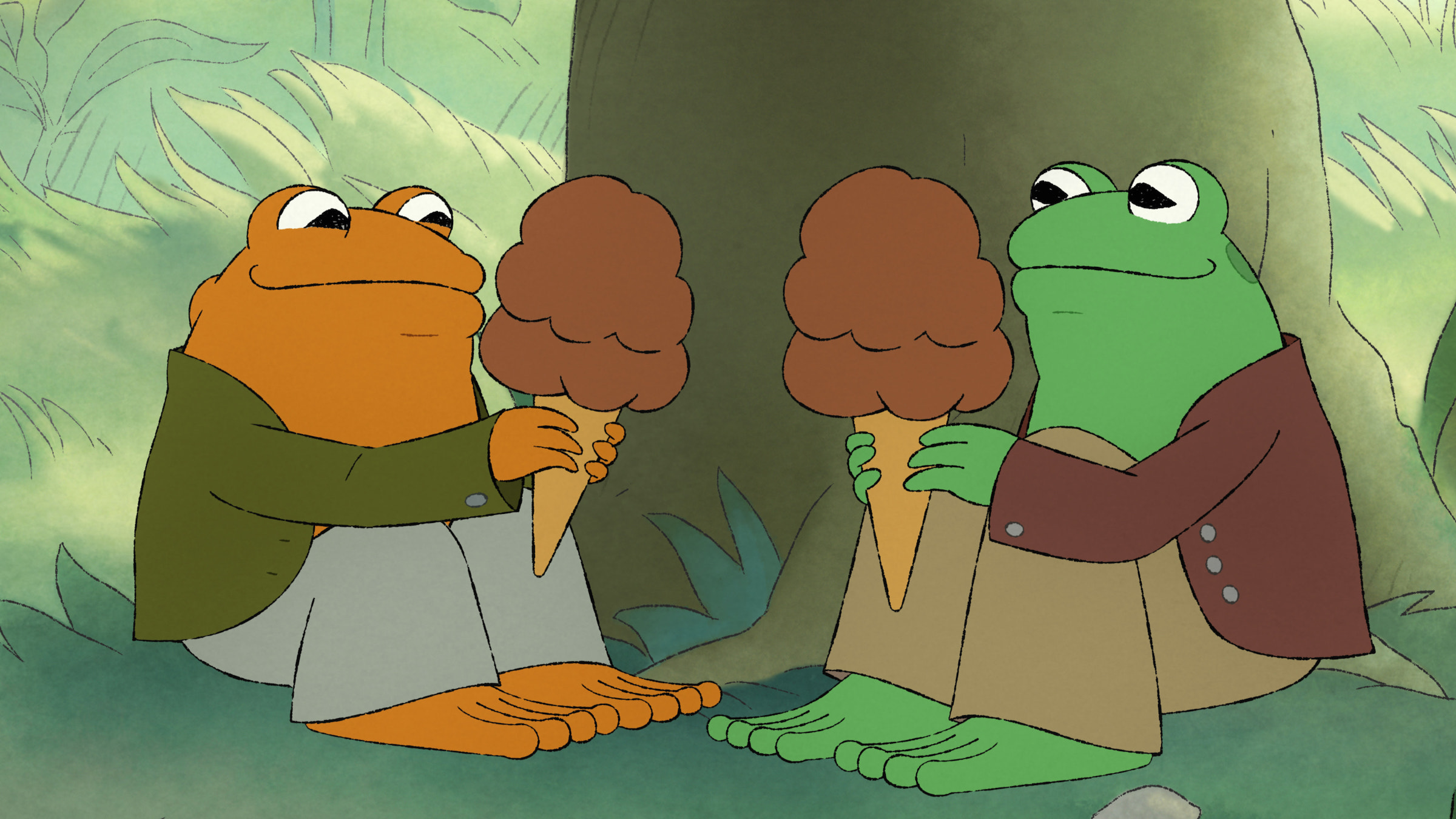 Toad (Kevin Michael Richardson) and Frog (Nat Faxon) enjoy chocolate ice cream in the shade. (Courtesy of Apple TV+)