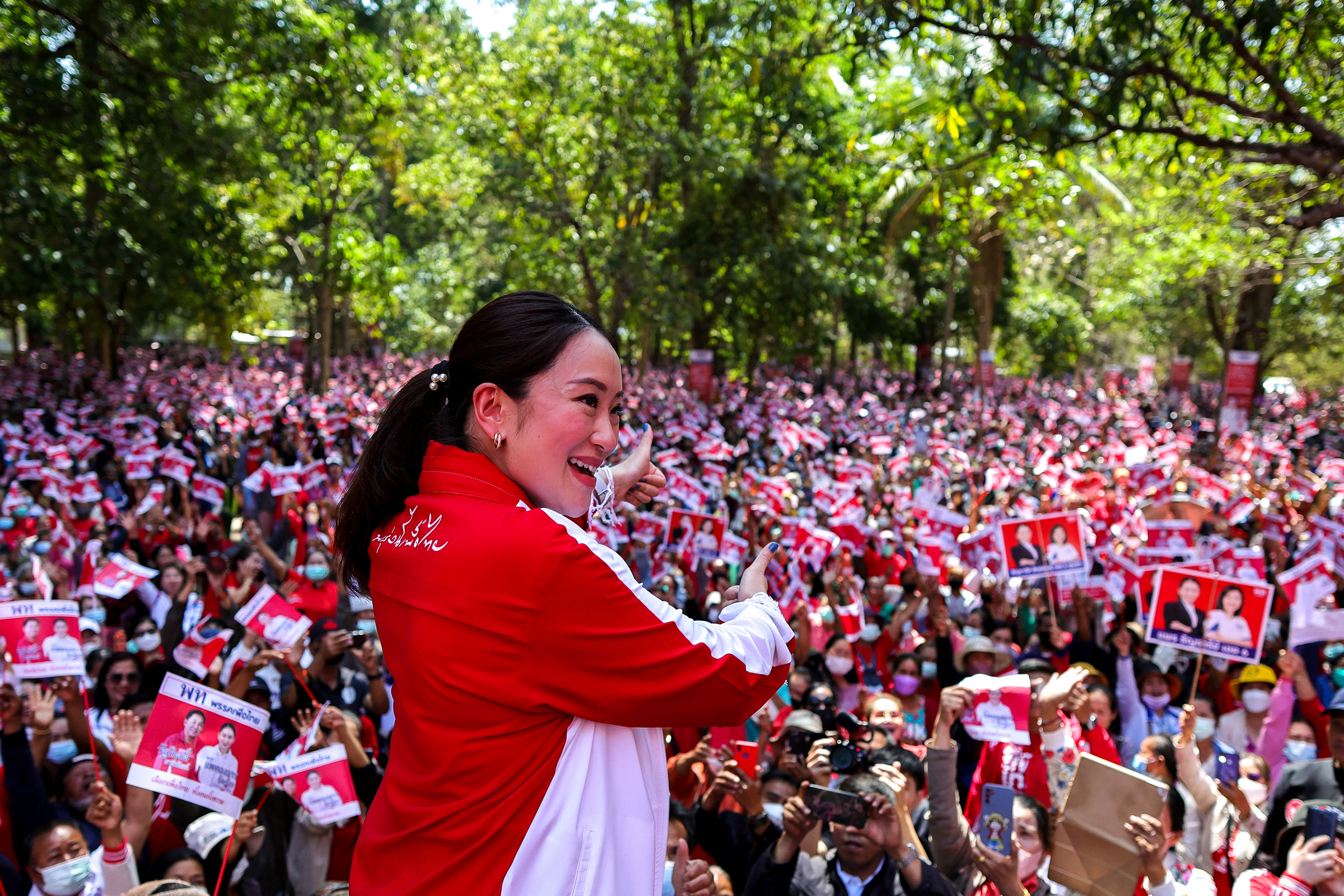Paetongtarn Shinawatra, 36, the Pheu Thai Party's most visible candidate for prime minister, greets supporters during the general election campaign at a temple in Ubon Ratchathani province, Thailand, on Feb. 17. (Athit Perawongmetha—Reuters)