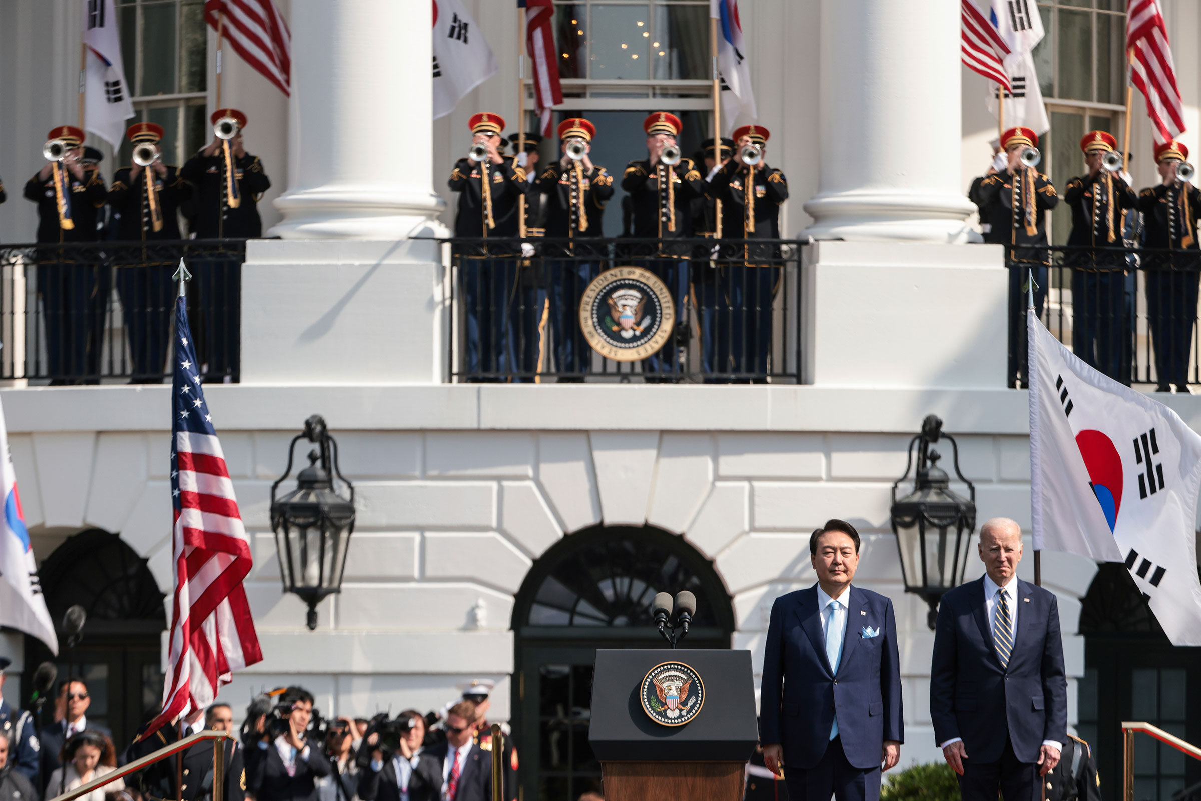 South Korea's President Yoon Suk Yeol stands with President Biden on the South Lawn of The White House in Washington, DC on April 26, 2023. (Oliver Contreras—Sipa USA/AP)