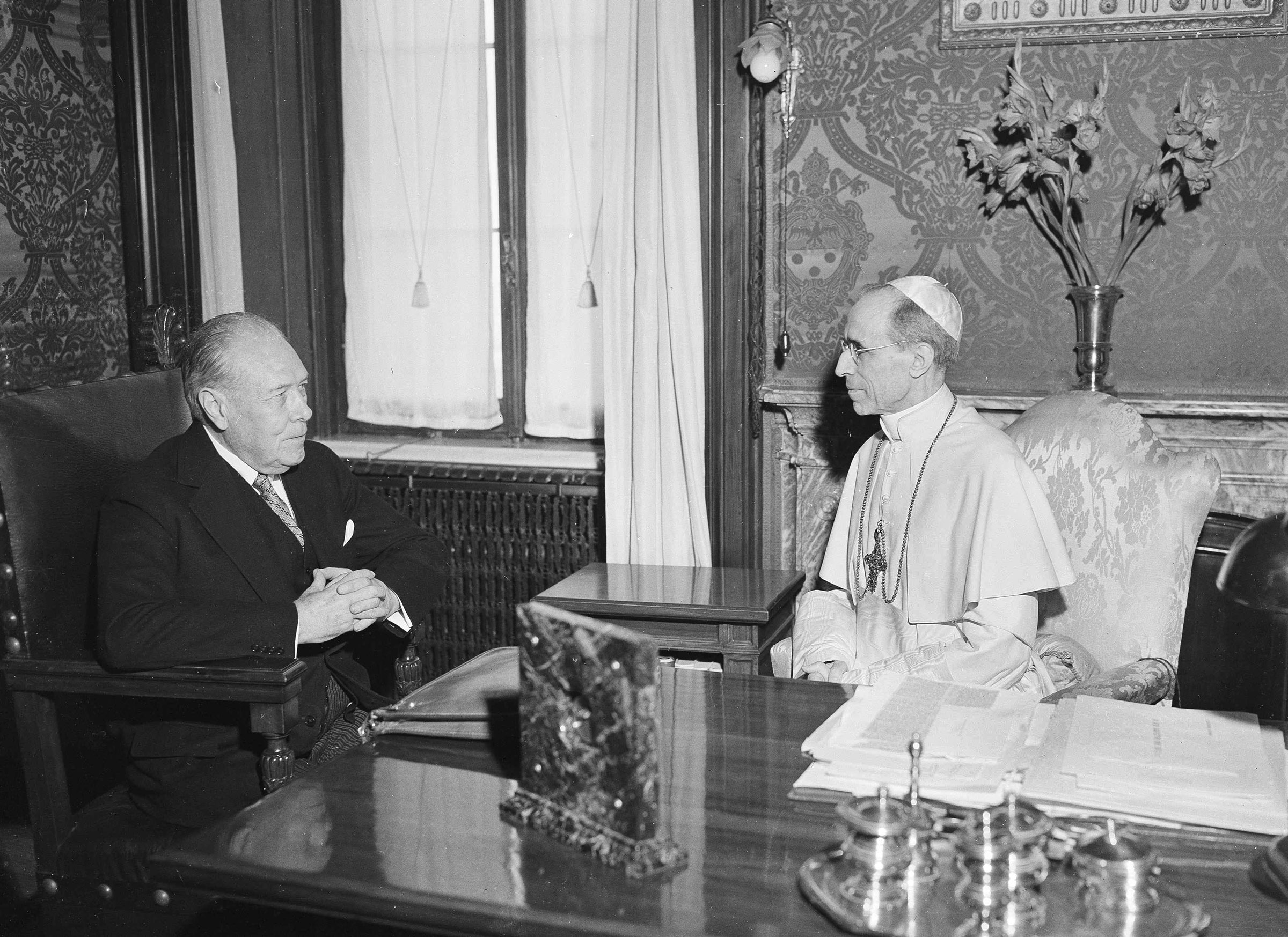 President Truman’s envoy to the Vatican, Myron C. Taylor, left, has an audience with Pope Pius XII at Castelgandolfo near Rome, on Aug. 26, 1947. (Luigi Felici—AP)