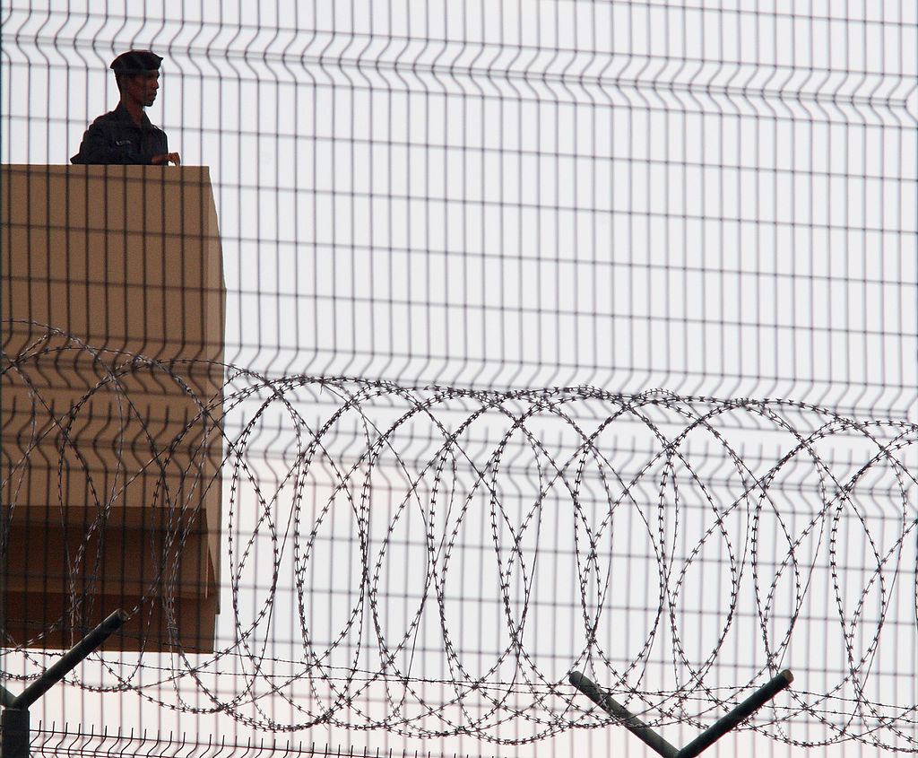 A guard keeps watch over Changi Prison on Nov. 24, 2005 in Singapore.