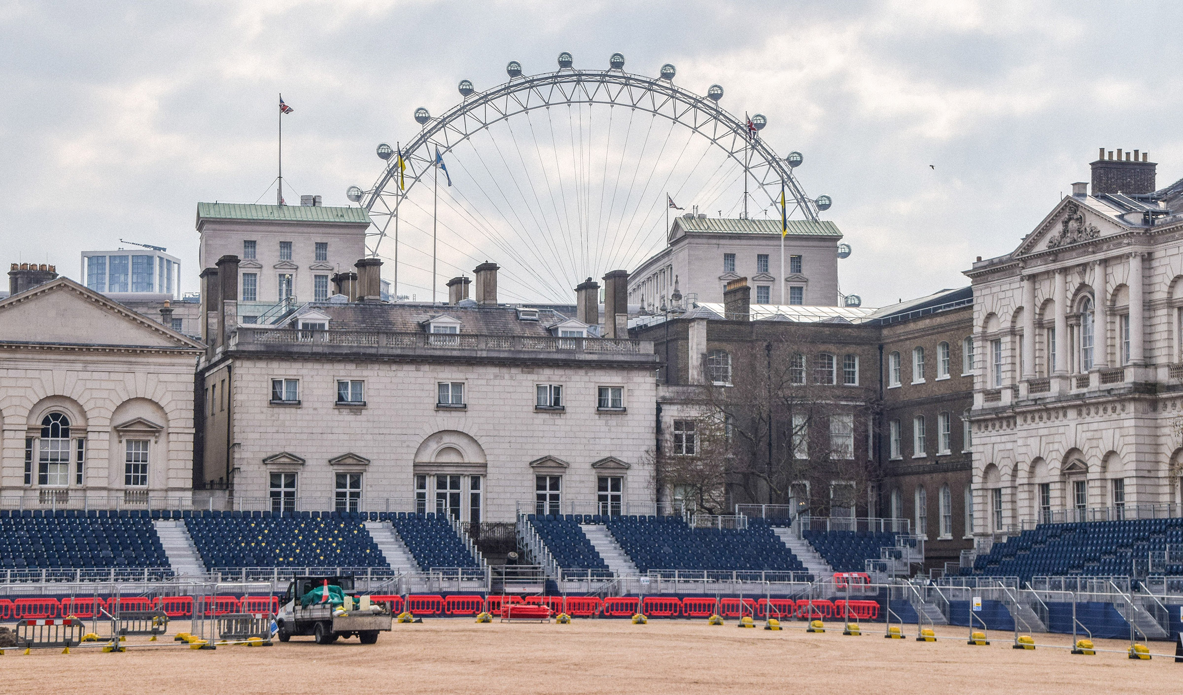 Workers set up seats at Horse Guards Parade on April 17.  (Vuk Vlasic-SOPA Images/Shutterstock)