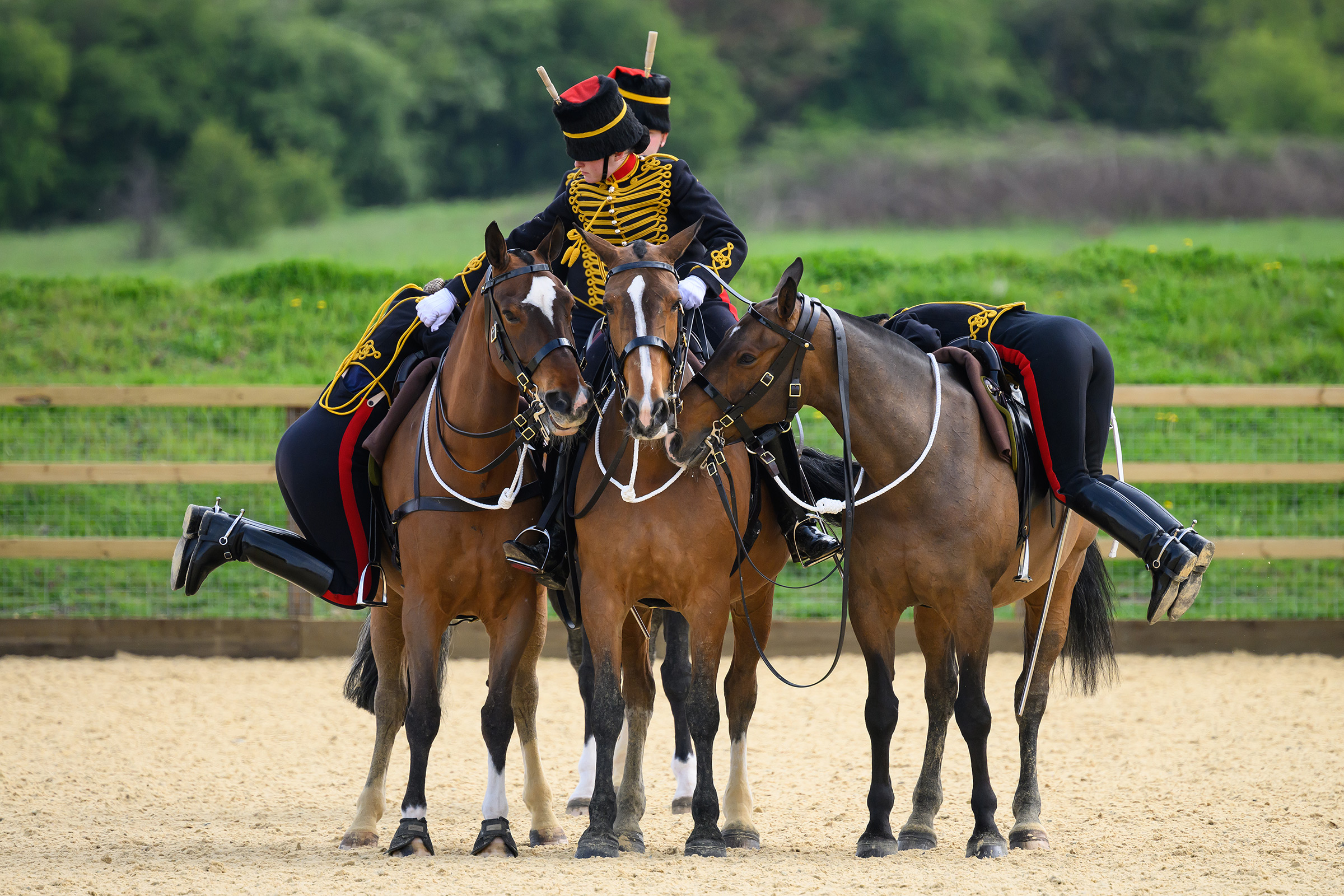 Soldiers from The Kings Troop Royal Horse Artillery remount their horses as they take part in the riding assessment needed to ride in ceremonial parades, on April 24.