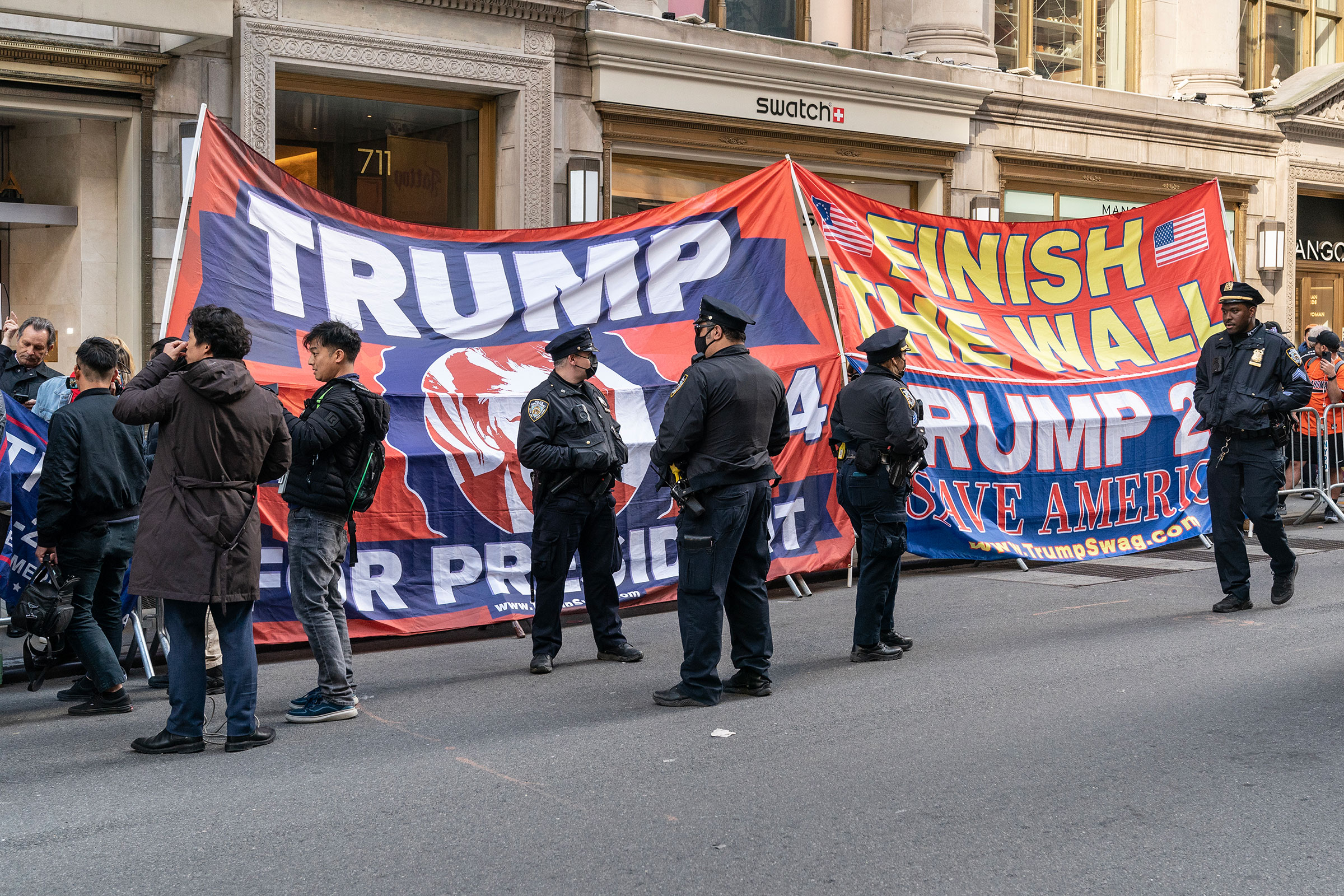 Supporters of Former President Donald Trump rally at Trump Tower in New York.