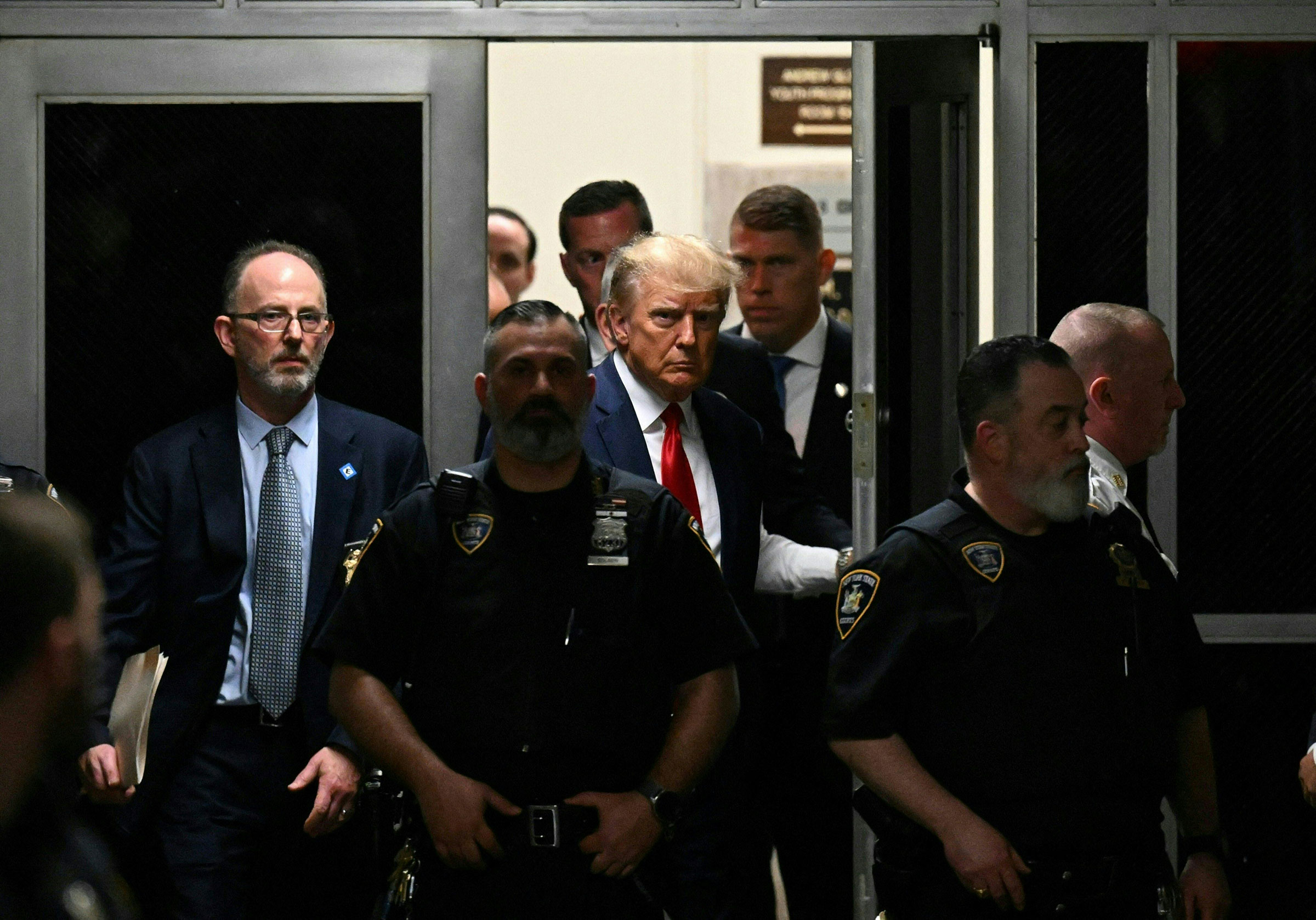 Former President Donald Trump makes his way inside the Manhattan Criminal Courthouse in New York City on April 4, 2023. (Ed Jones—AFP/Getty Images)