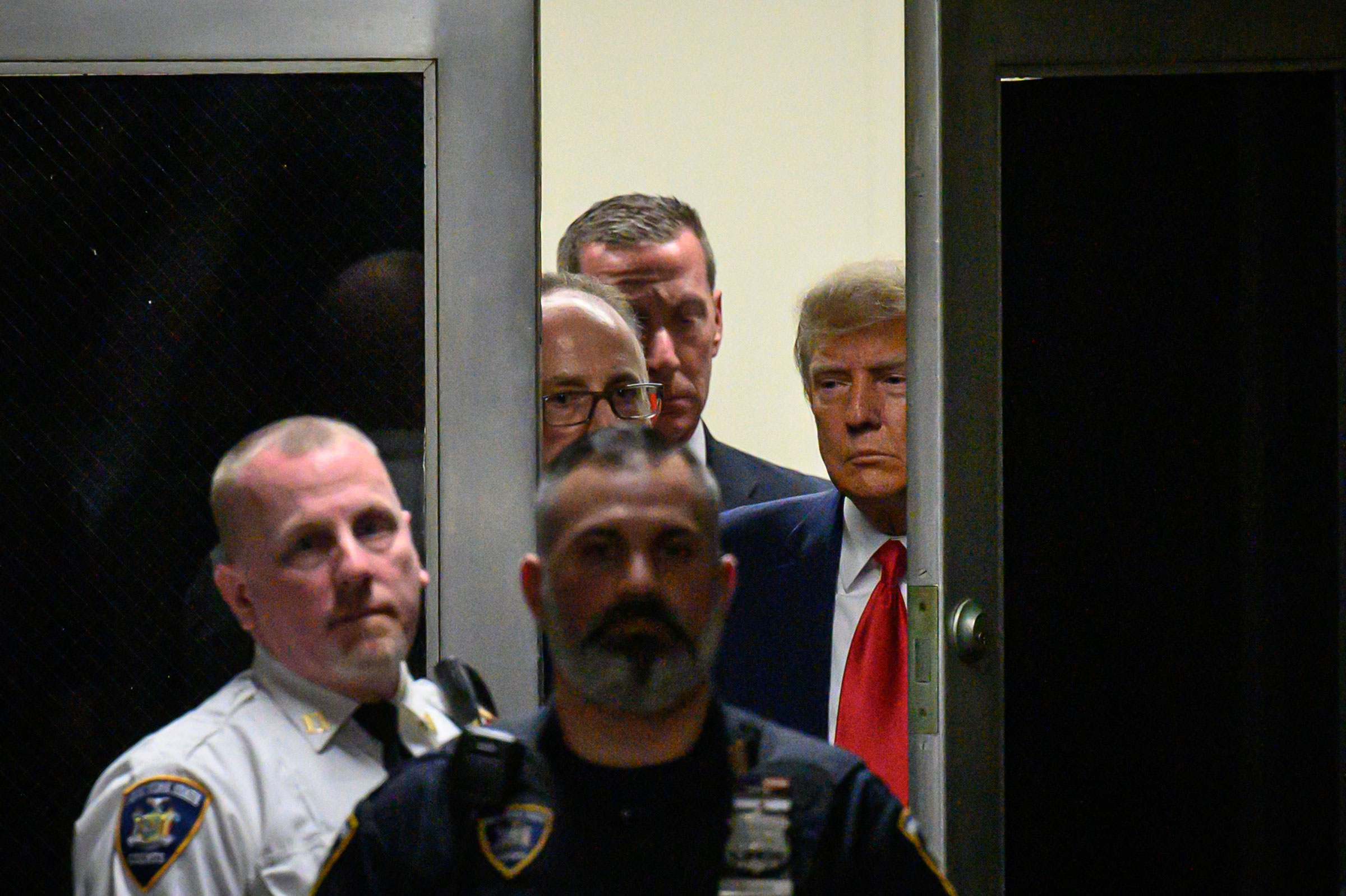 Former president Donald Trump arrives at the courtroom at the Manhattan Criminal Court on April 4, 2023.