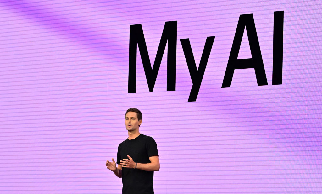 Evan Spiegel, founder and CEO of Snapchat, speaks at the 2023 Snap Partner Summit at the Barker Hangar in Santa Monica, California, where the focus was on immersive augmented reality experiences and tech for people attending music concerts, on April 19, 2023. (Frederic J. Brown–AFP/Getty Images)
