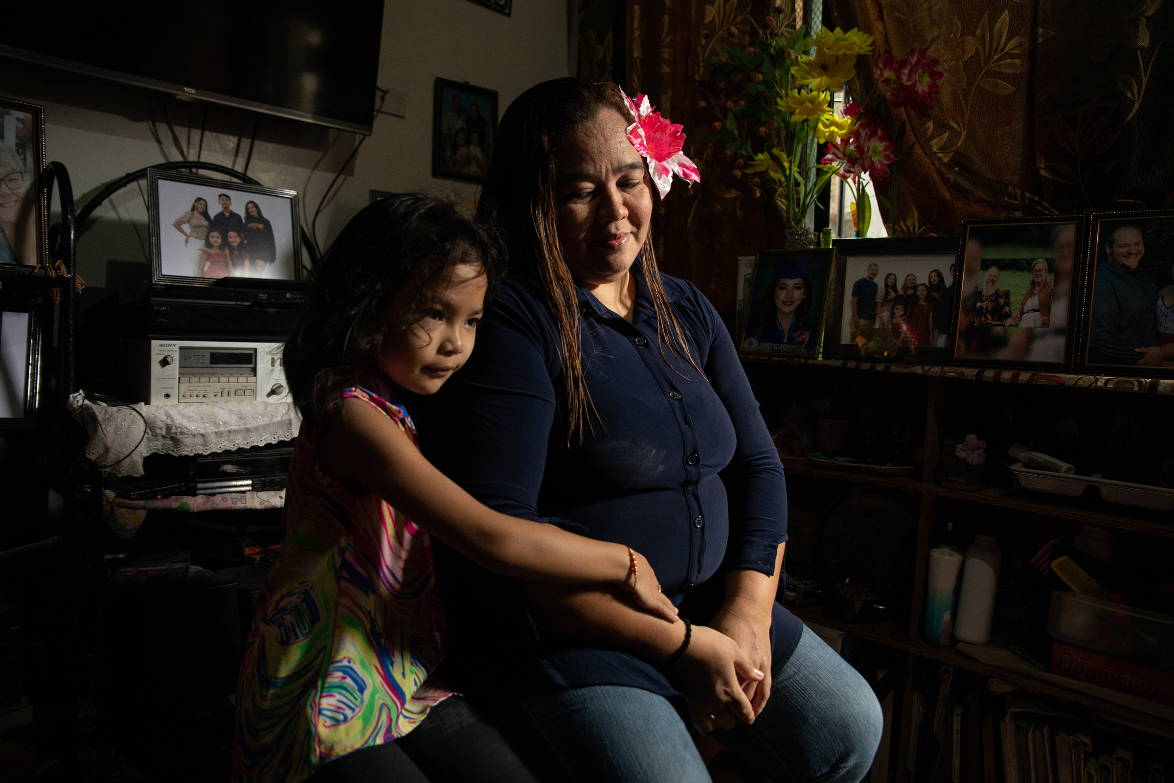 Michelleann Miller Pangilinan, an Amerasian who has struggled to become a U.S. citizen despite having the support of her American father and a DNA test to prove his paternity, photographed with her daughter Shania, at their home in Olongapo City on Feb. 19. (Geric Cruz for TIME)